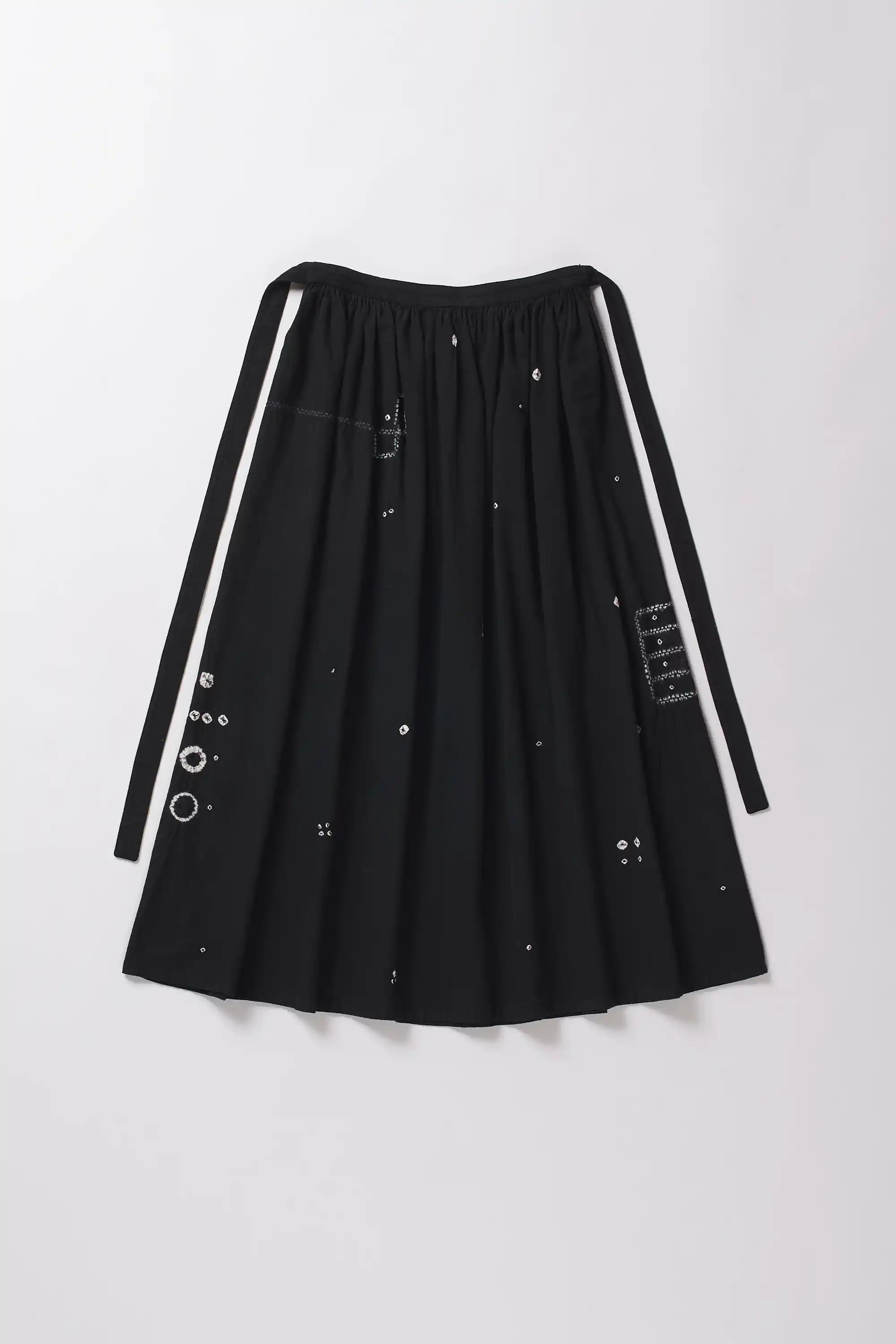 Black skirt with white stripes on a white background