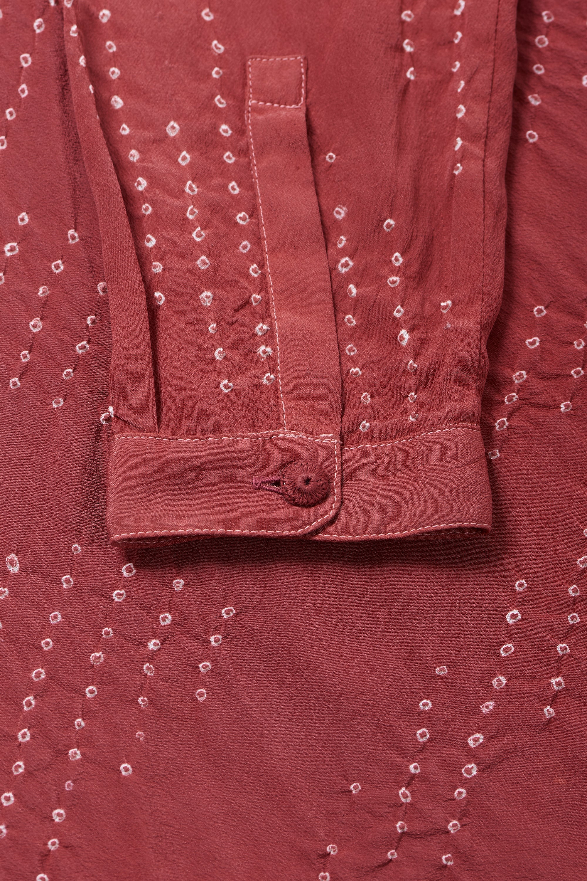 Crimsom Pink Crepe Silk Flared Shirt Featuring Miniature Bandhani