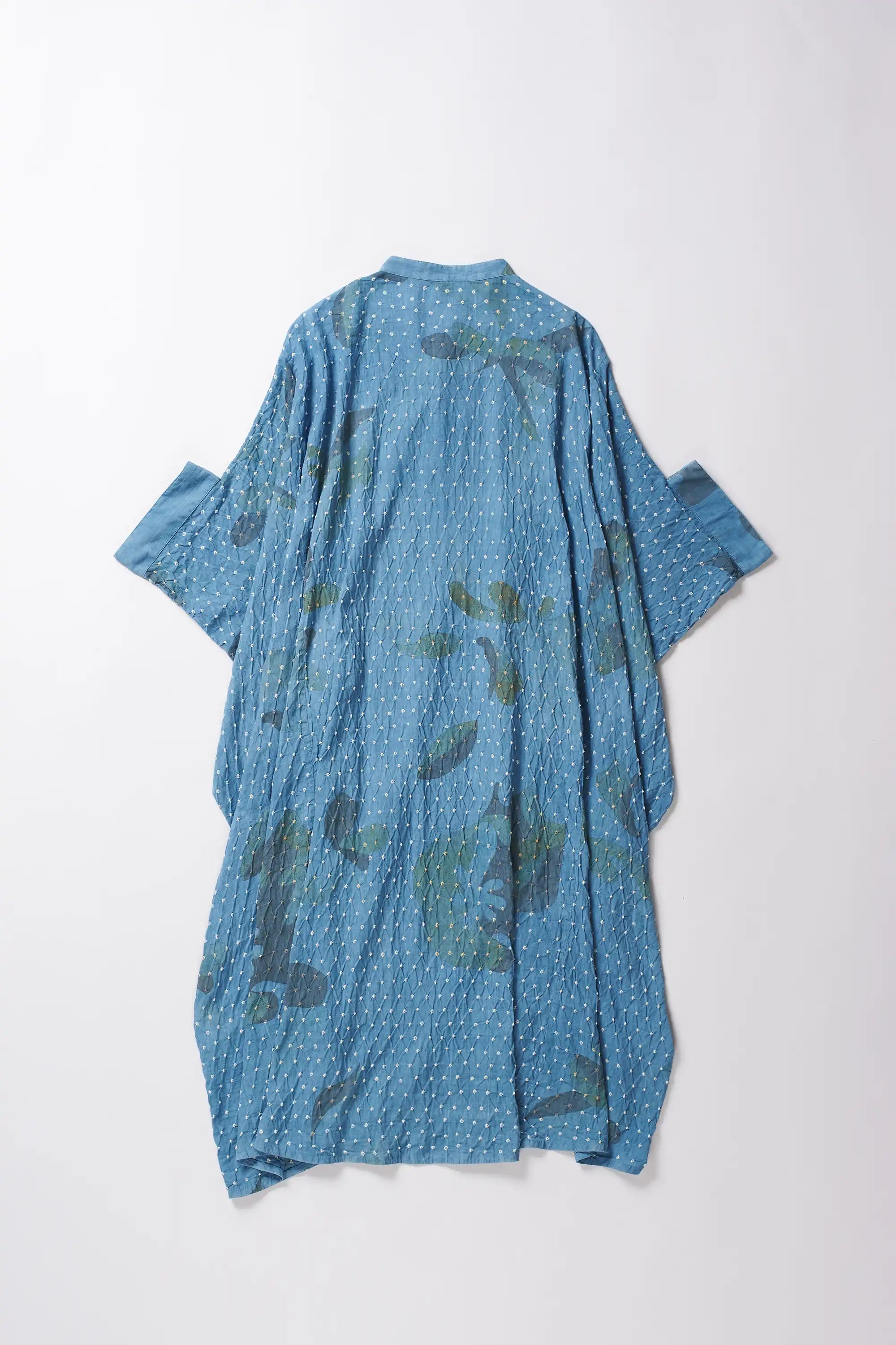 Back shot of a cotton light indigo dress