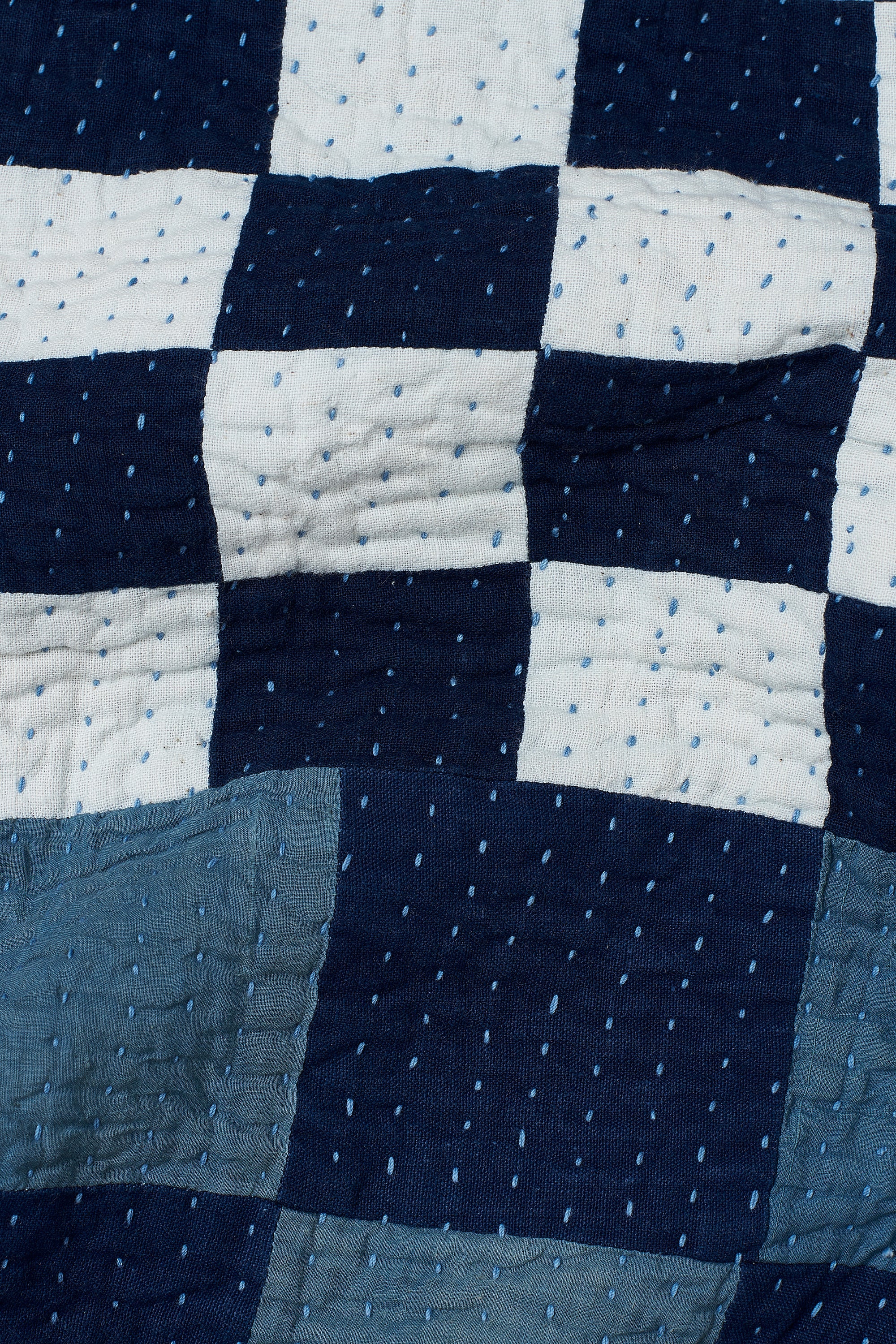 CHEQUERED PATCHWORK CUSHION IN SHADES OF INDIGO