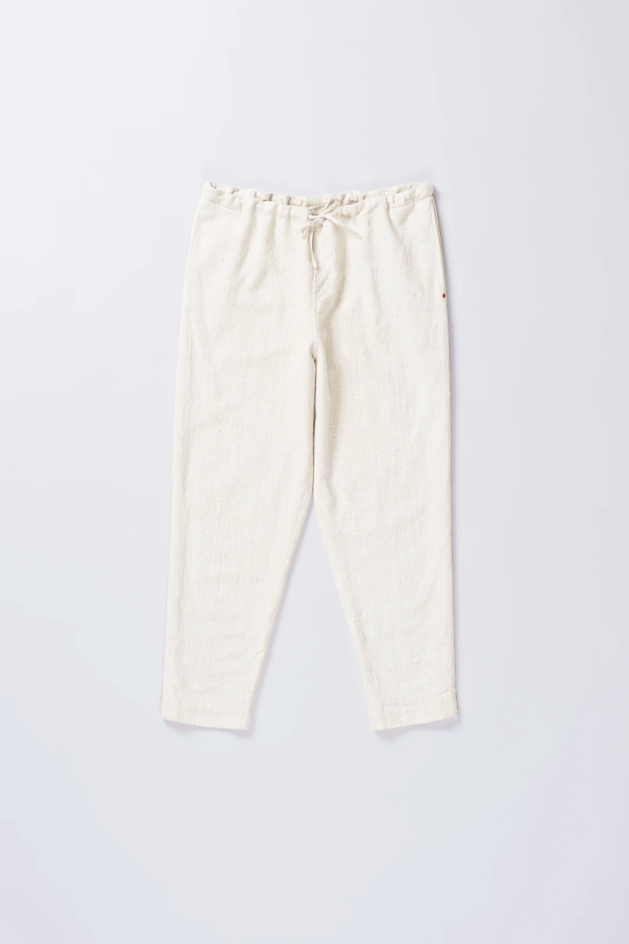 Front image of ecru cotton pant with drawstring