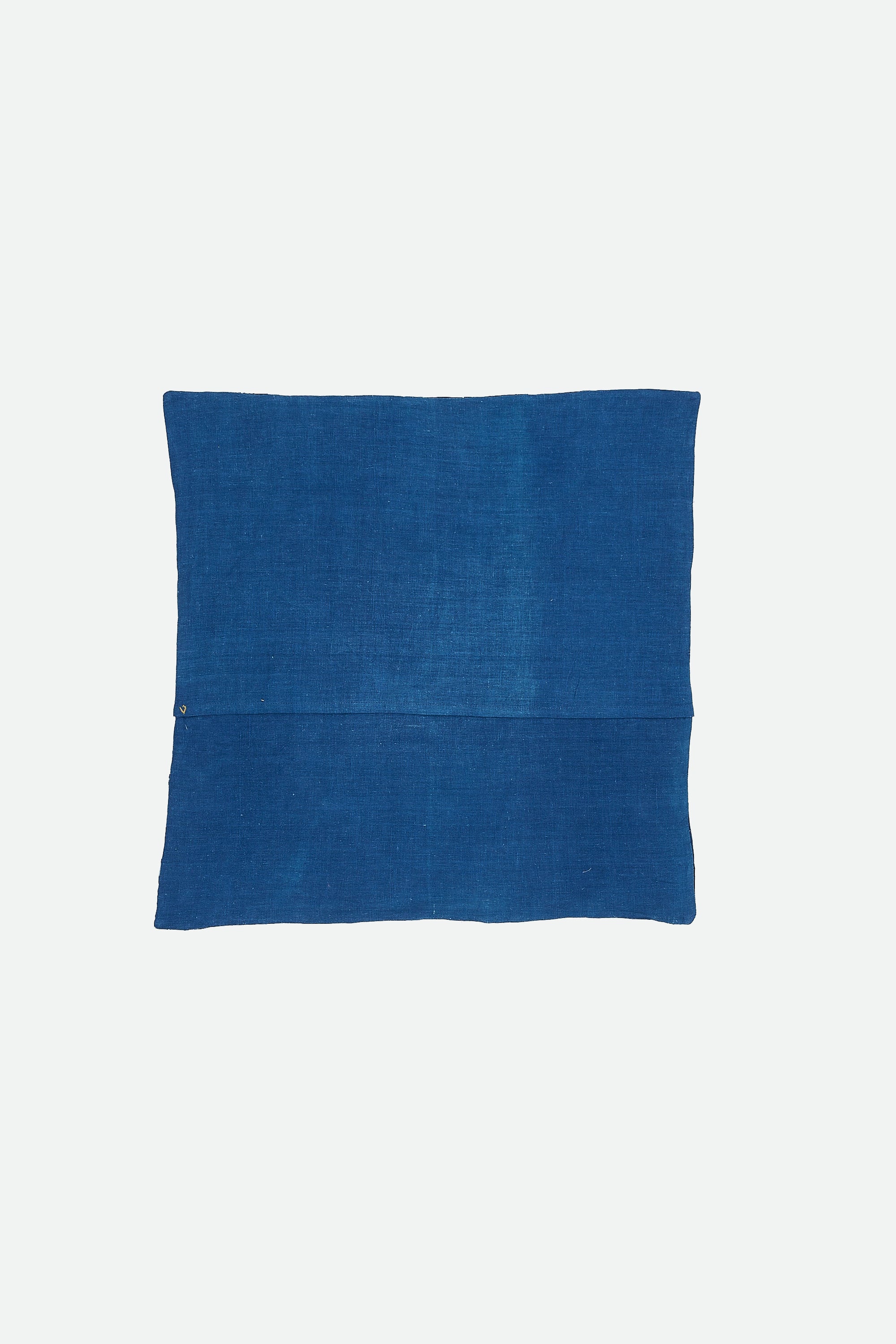 ANGULAR PATCHWORK CUSHION IN SHADES OF INDIGO