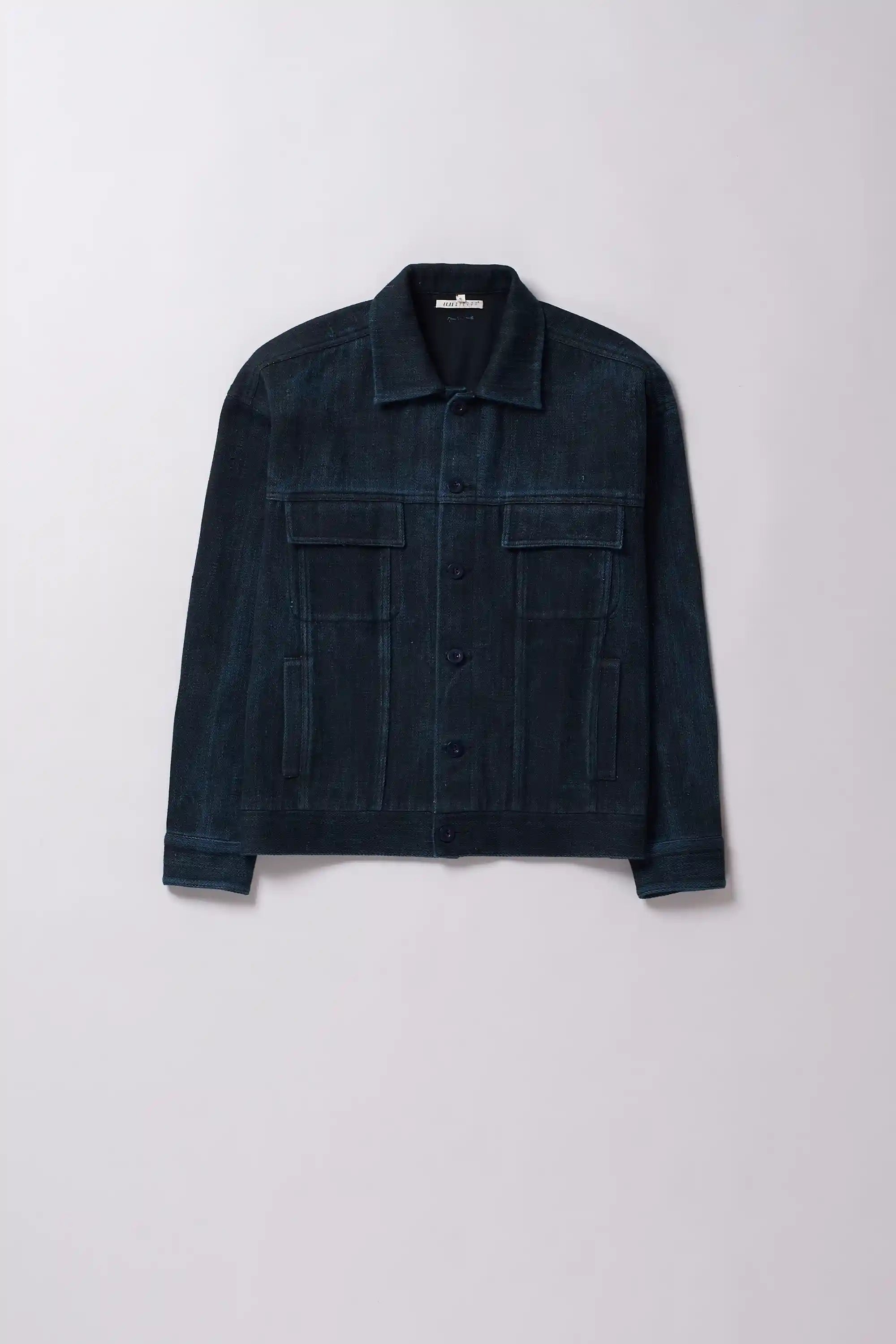 Front image of black denim jacket