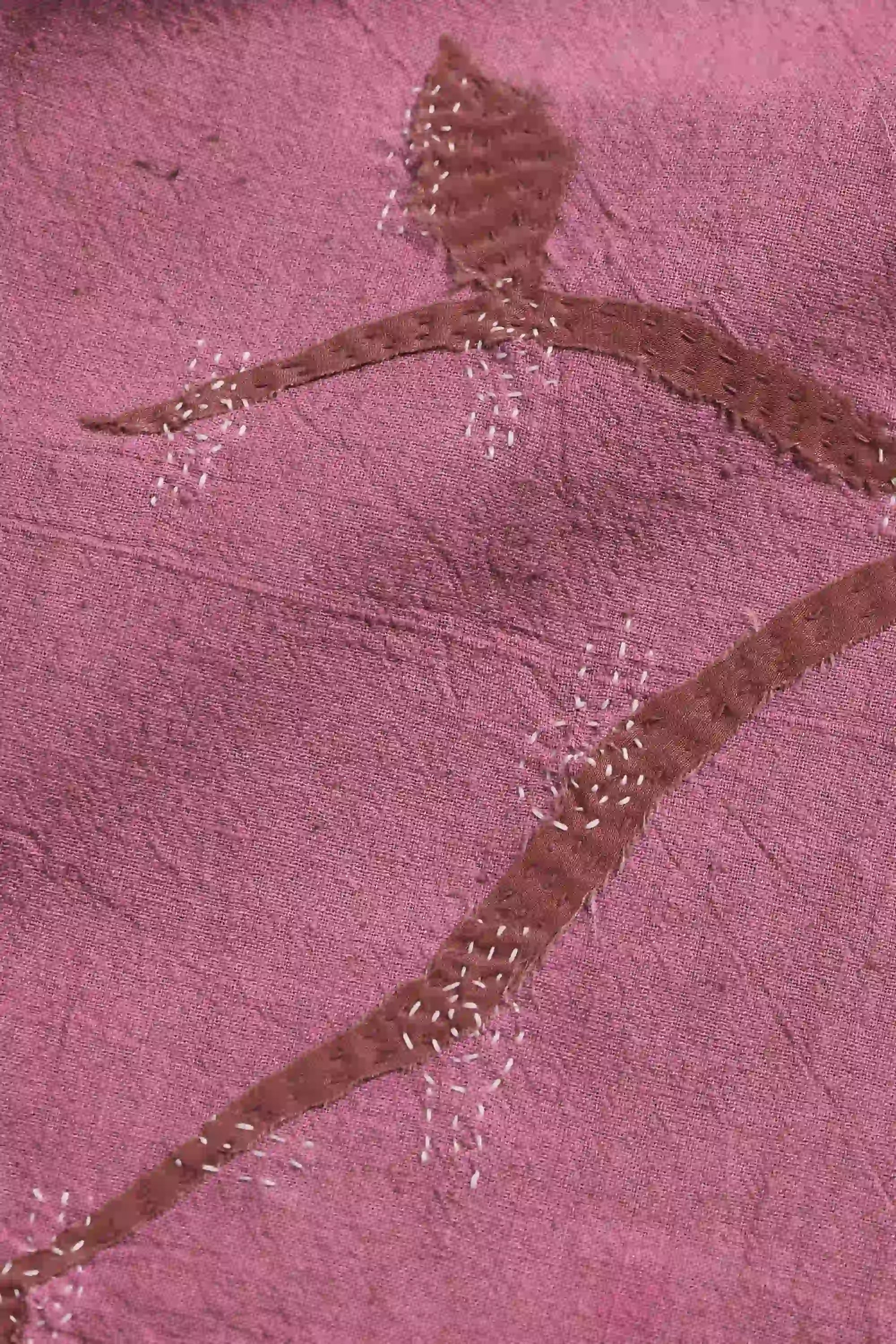 Fabric close-up with patchwork and kantha work