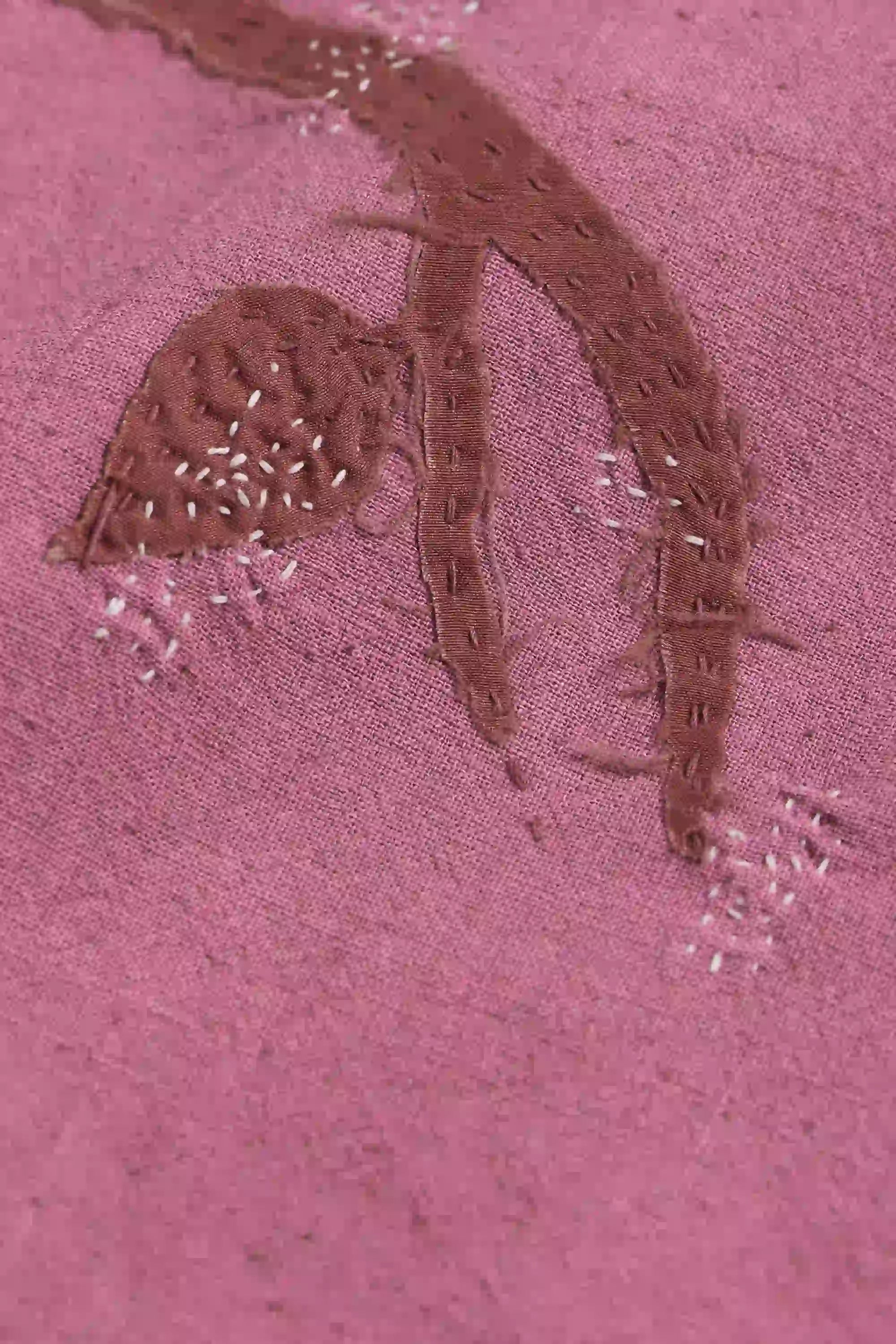 Fabric close-up with hand work