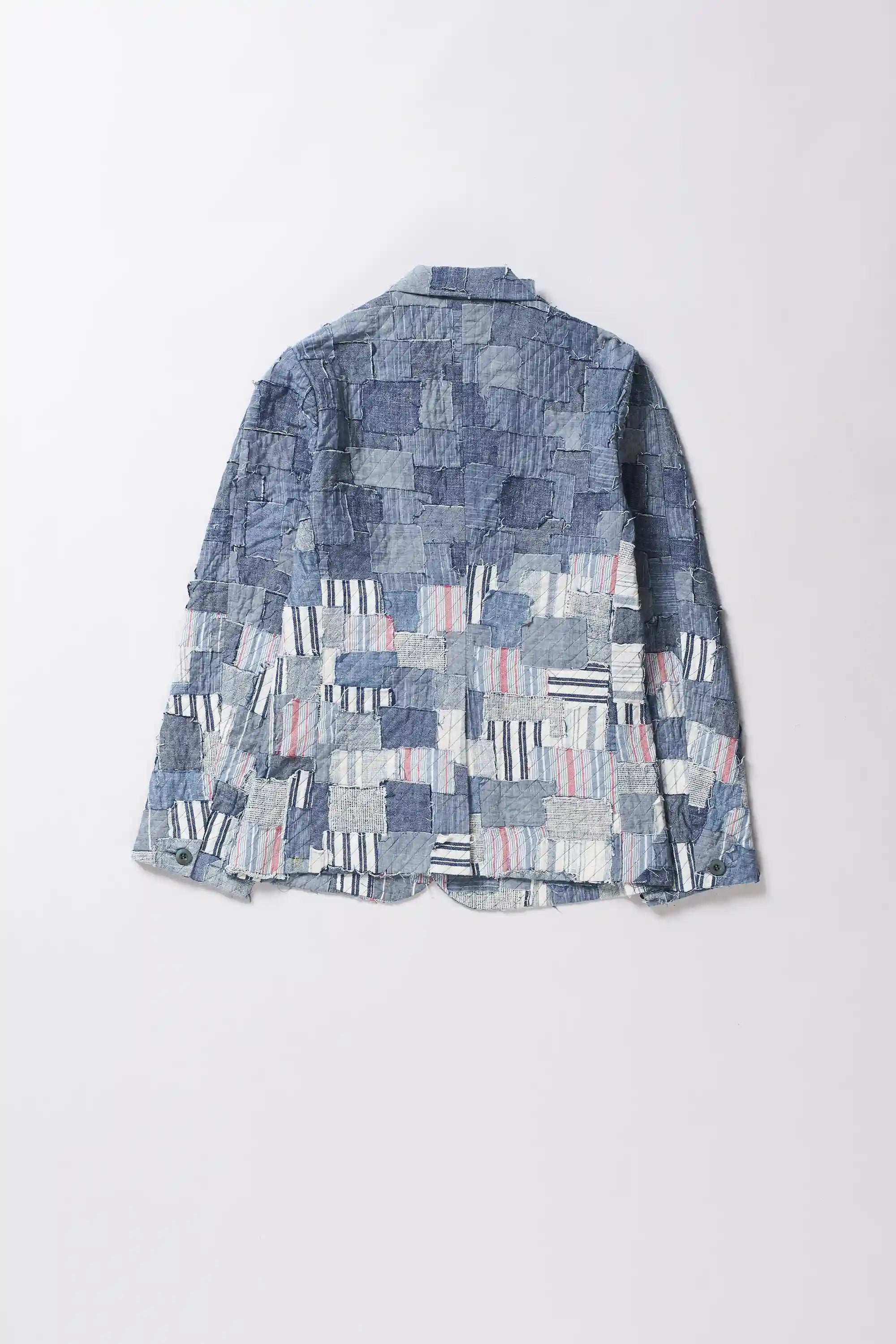 Patchwork denim jacket on a white background