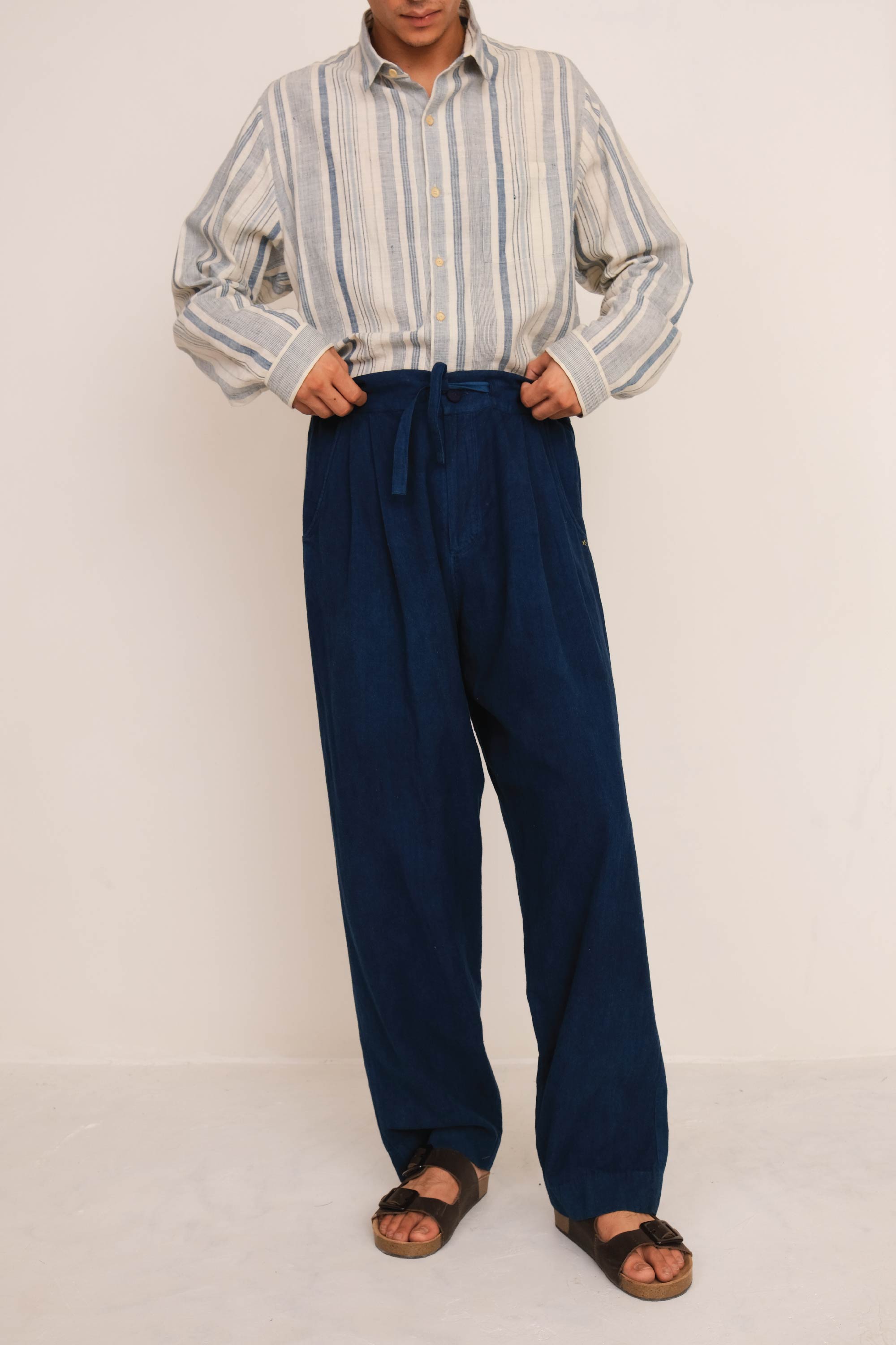 A man wearing indigo cotton pant