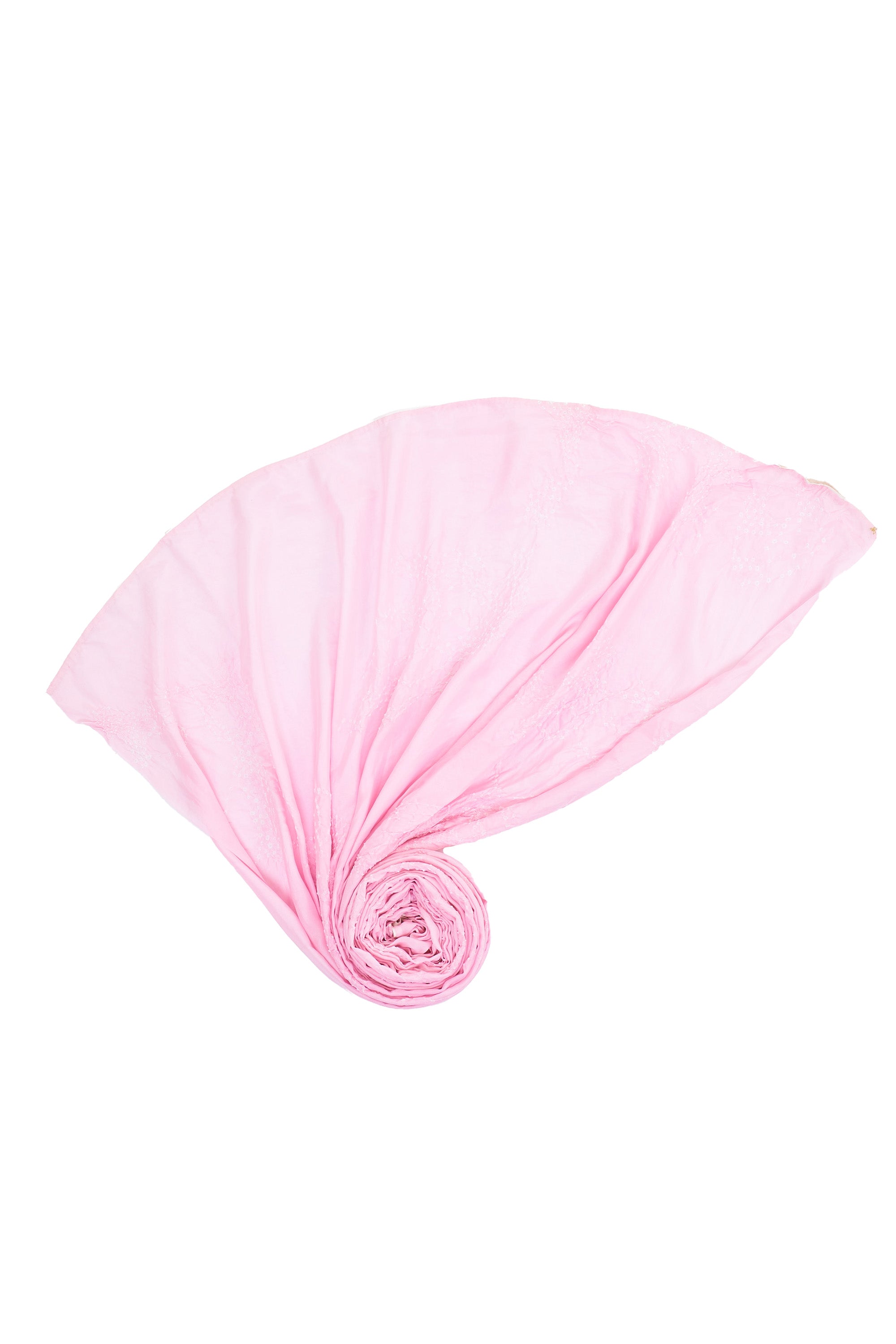 A light pink silk scarf with bandhani tie-dye pattern.