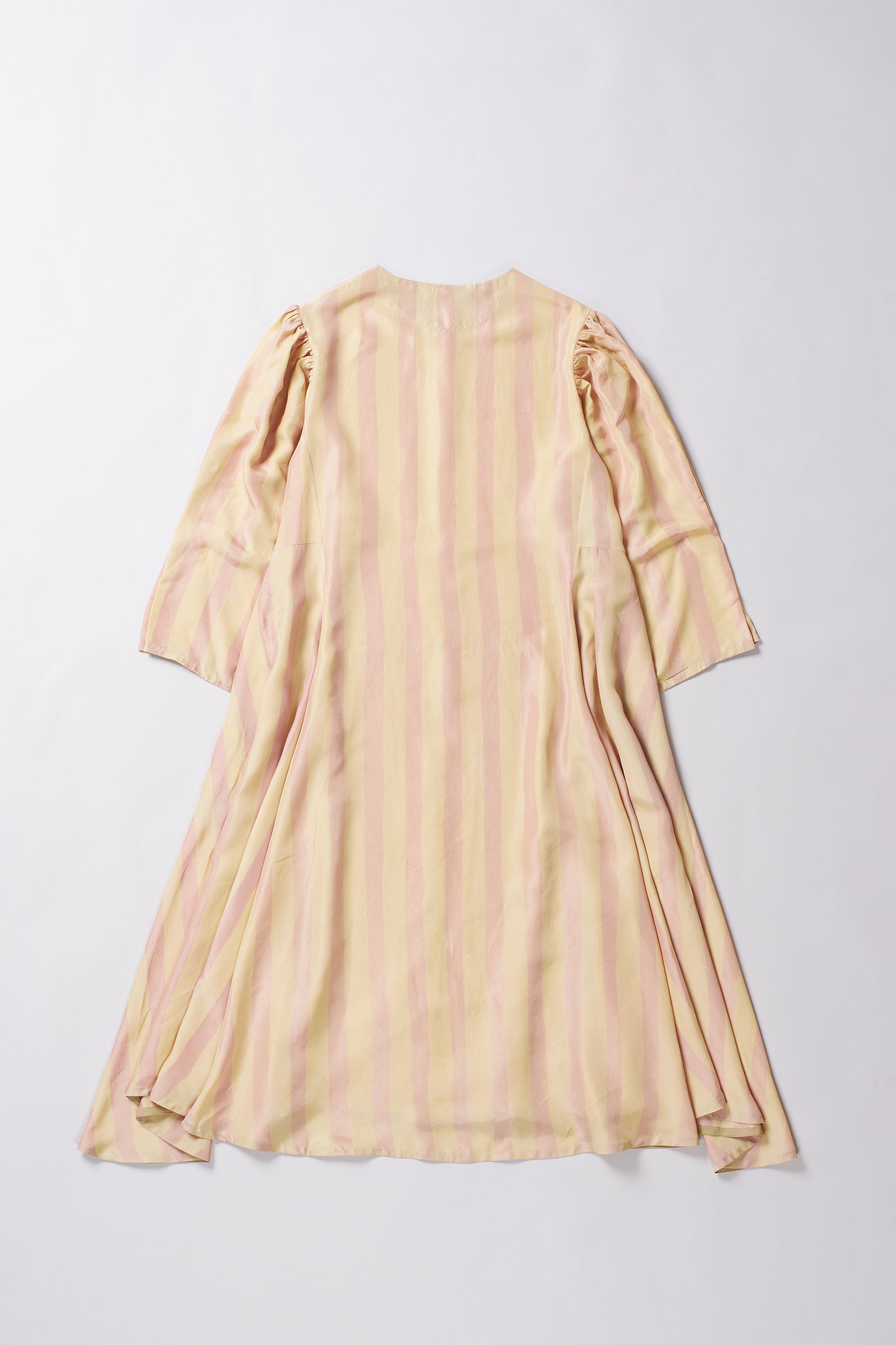 Beige dress with long sleeves