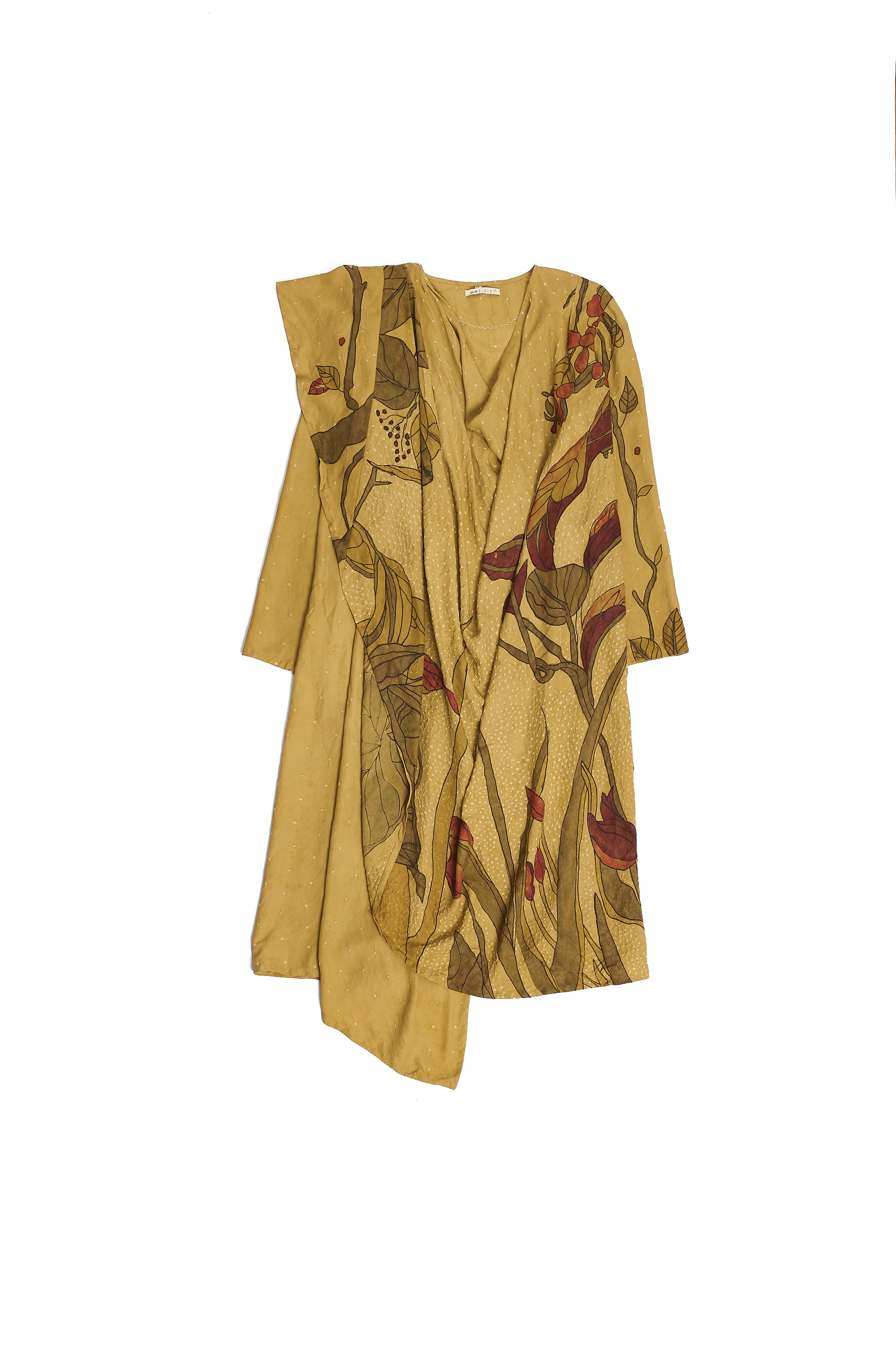 Long, patterned dress with a fitted bodice and flowing skirt