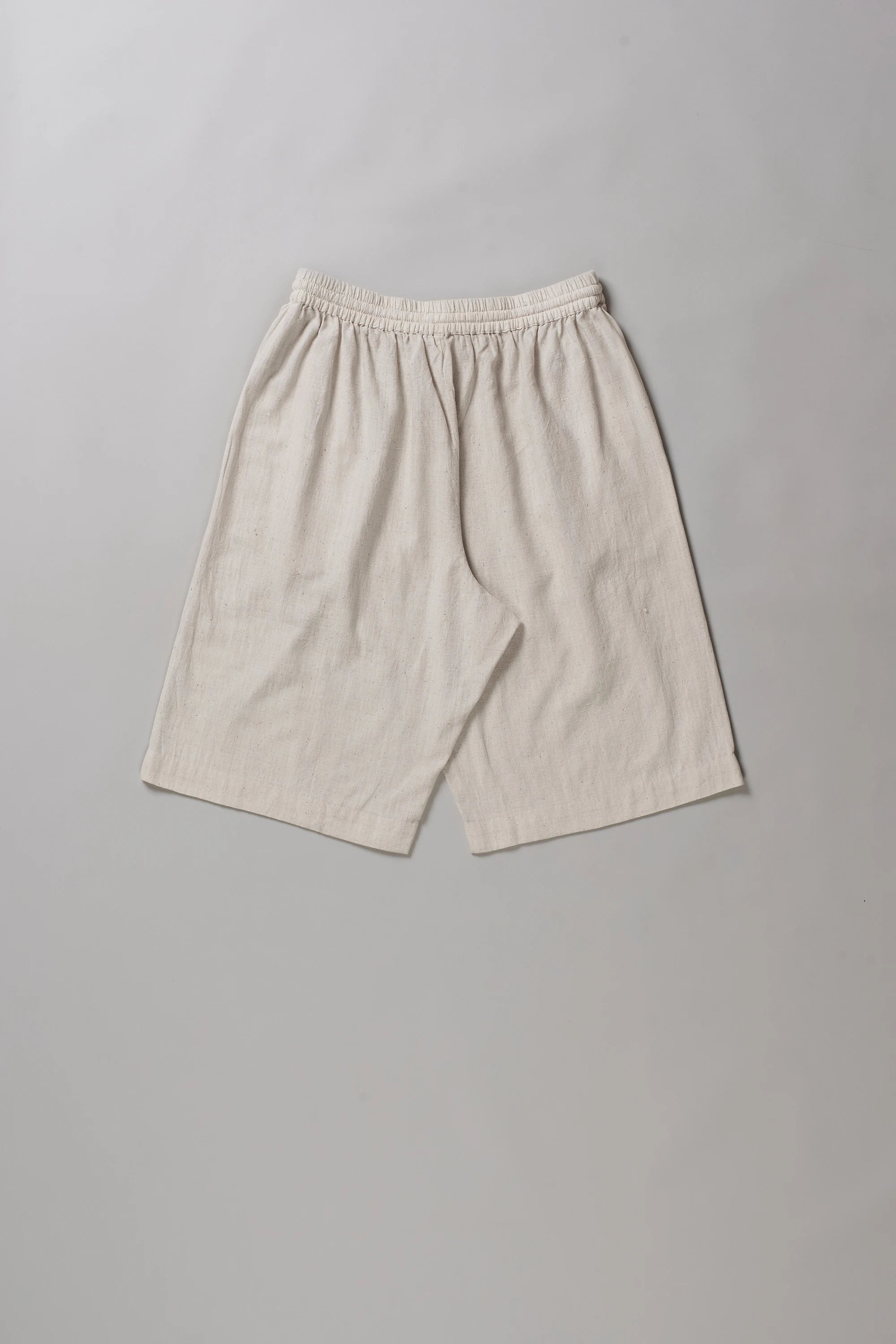 Back image of ecru shorts