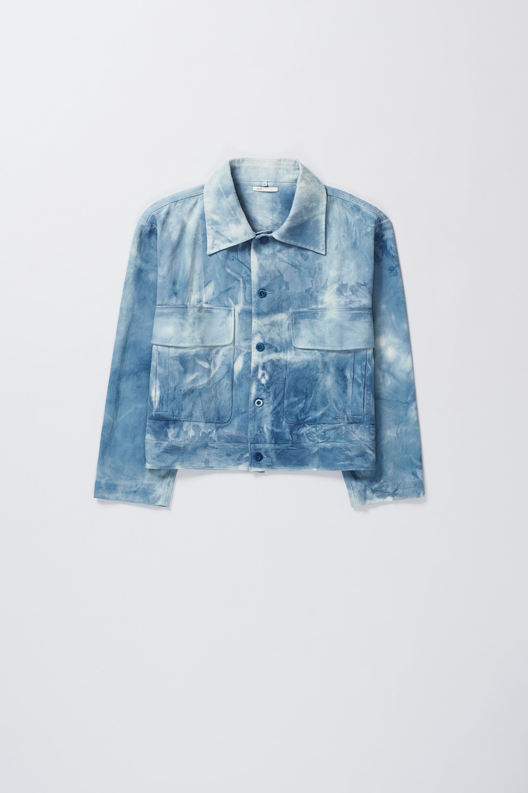 INDIGO WASHED HANDWOVEN DENIM TRUCKER JACKET DEOXIDISED IN A NATURAL SOLUTION