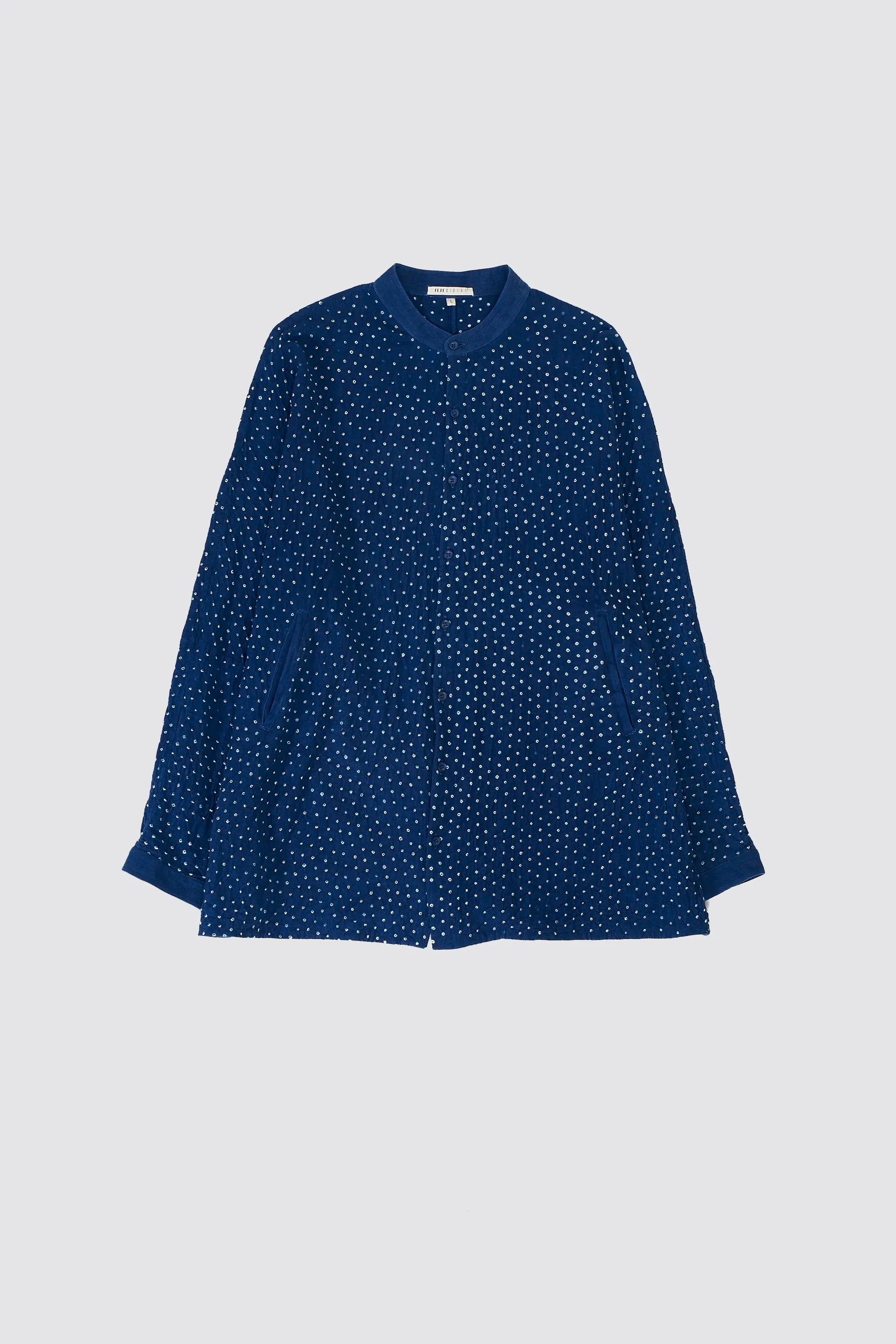 Front image of medium indigo cotton shirt with bandhani