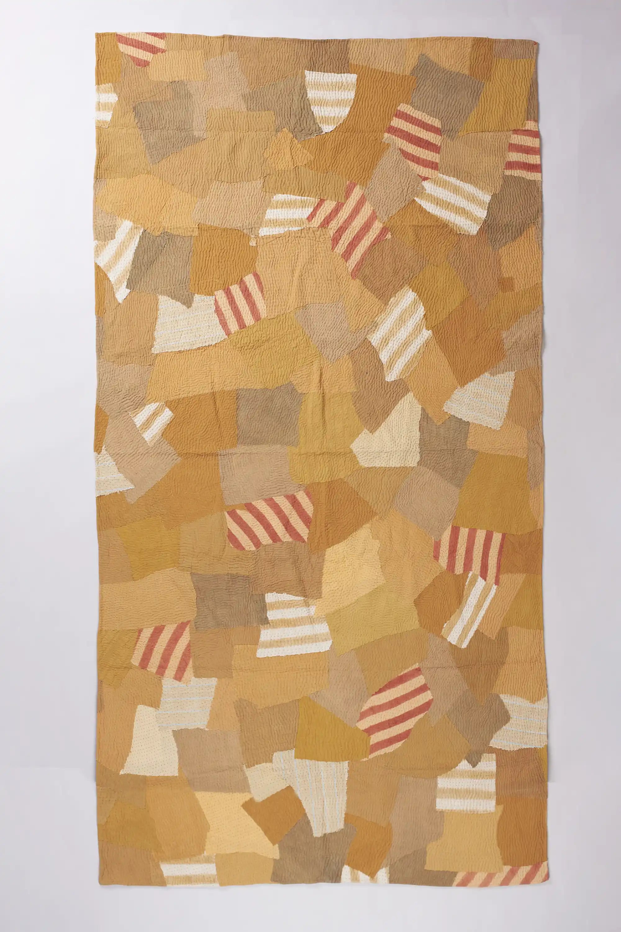 Patchwork quilt in shades of yellow
