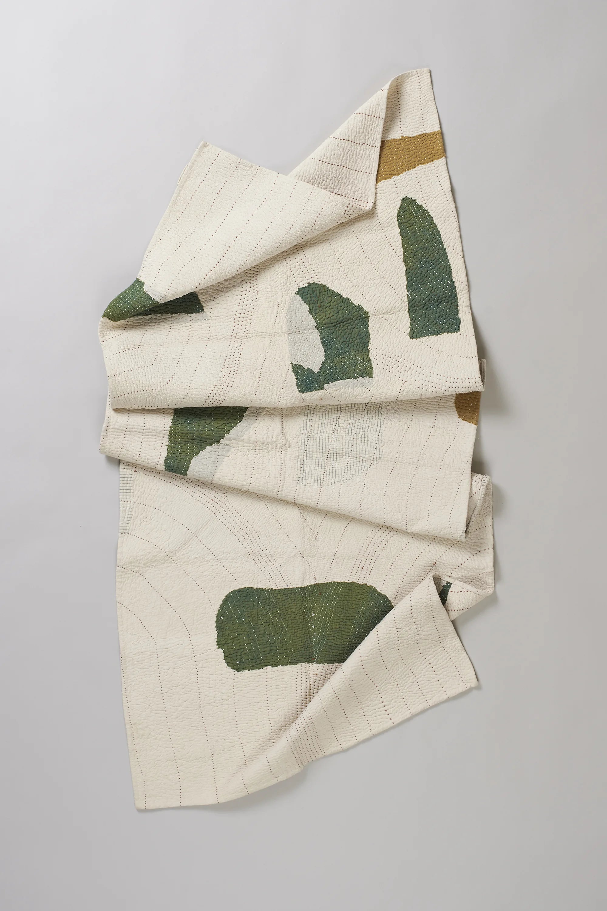 Folded ecru quilt