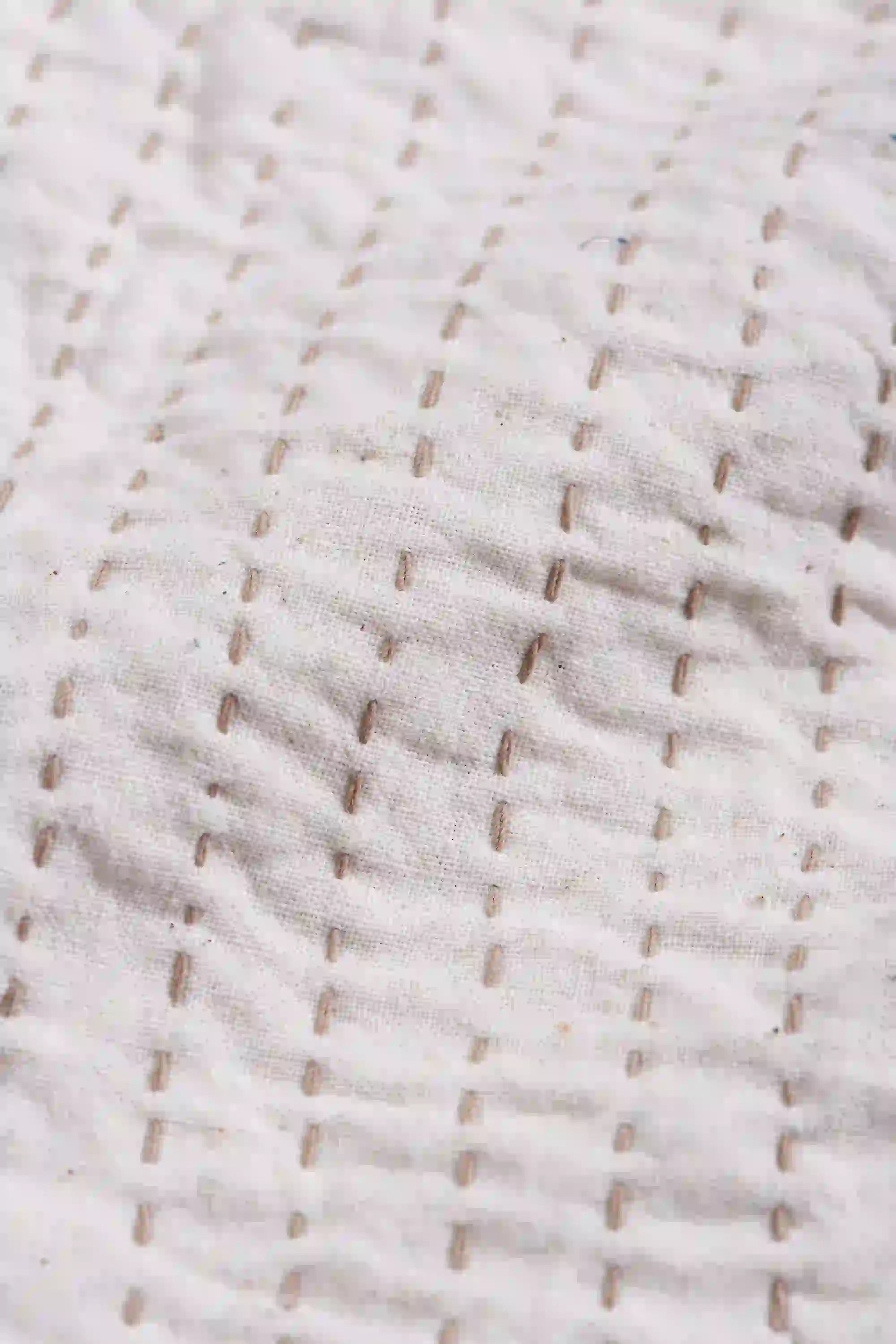 Close-up of woven fabric with a subtle pattern