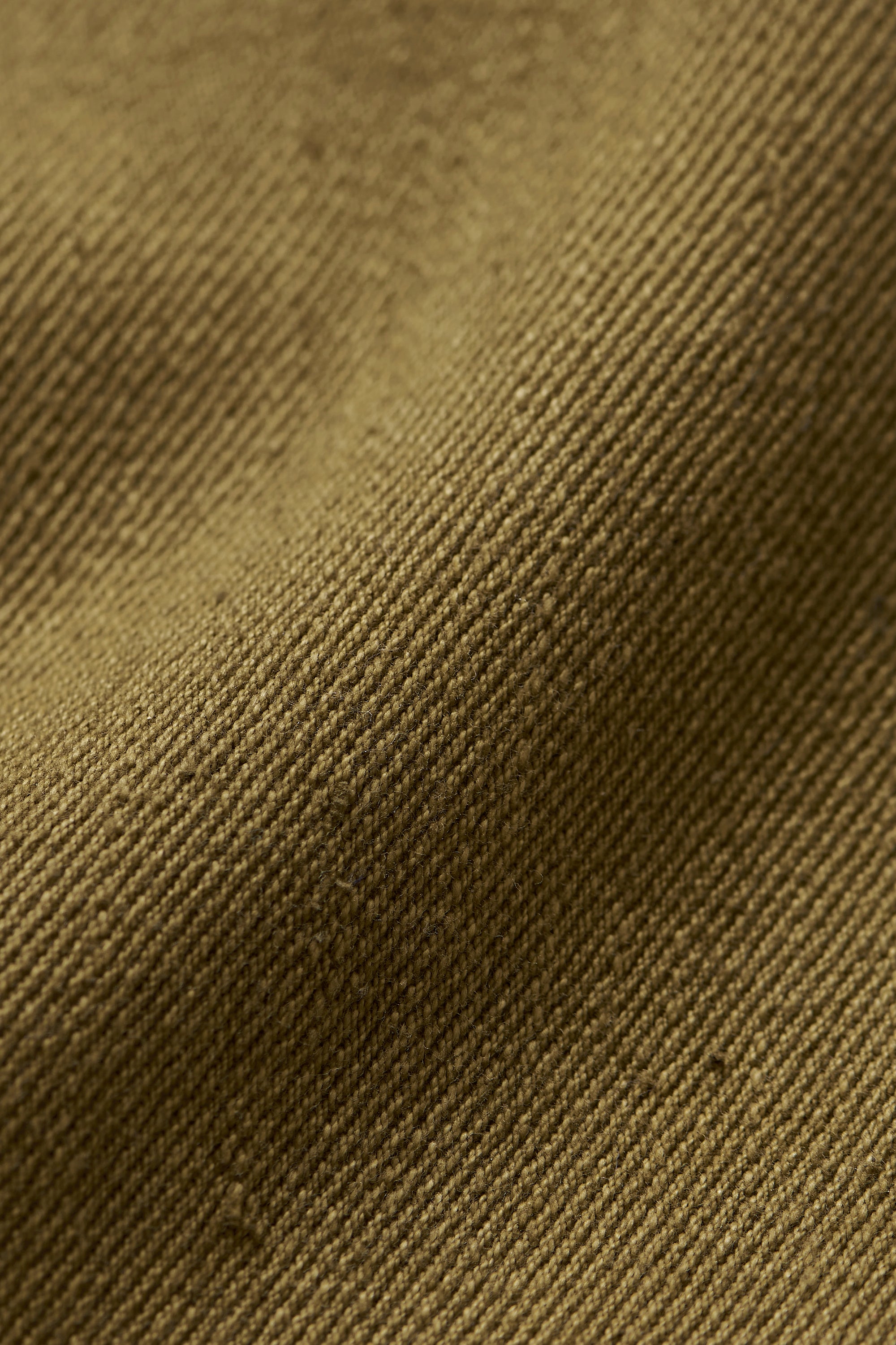 TAPERED HANDSPUN AND HANDWOVEN DENIM TROUSERS