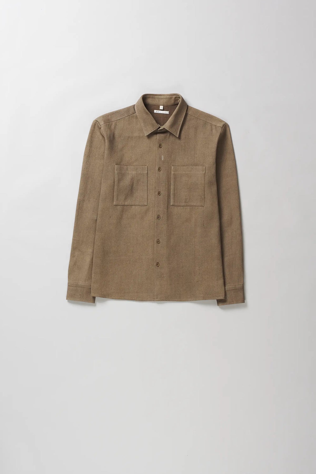 A brown long-sleeve button-up shirt with two chest pockets, laid flat against a light grey background.