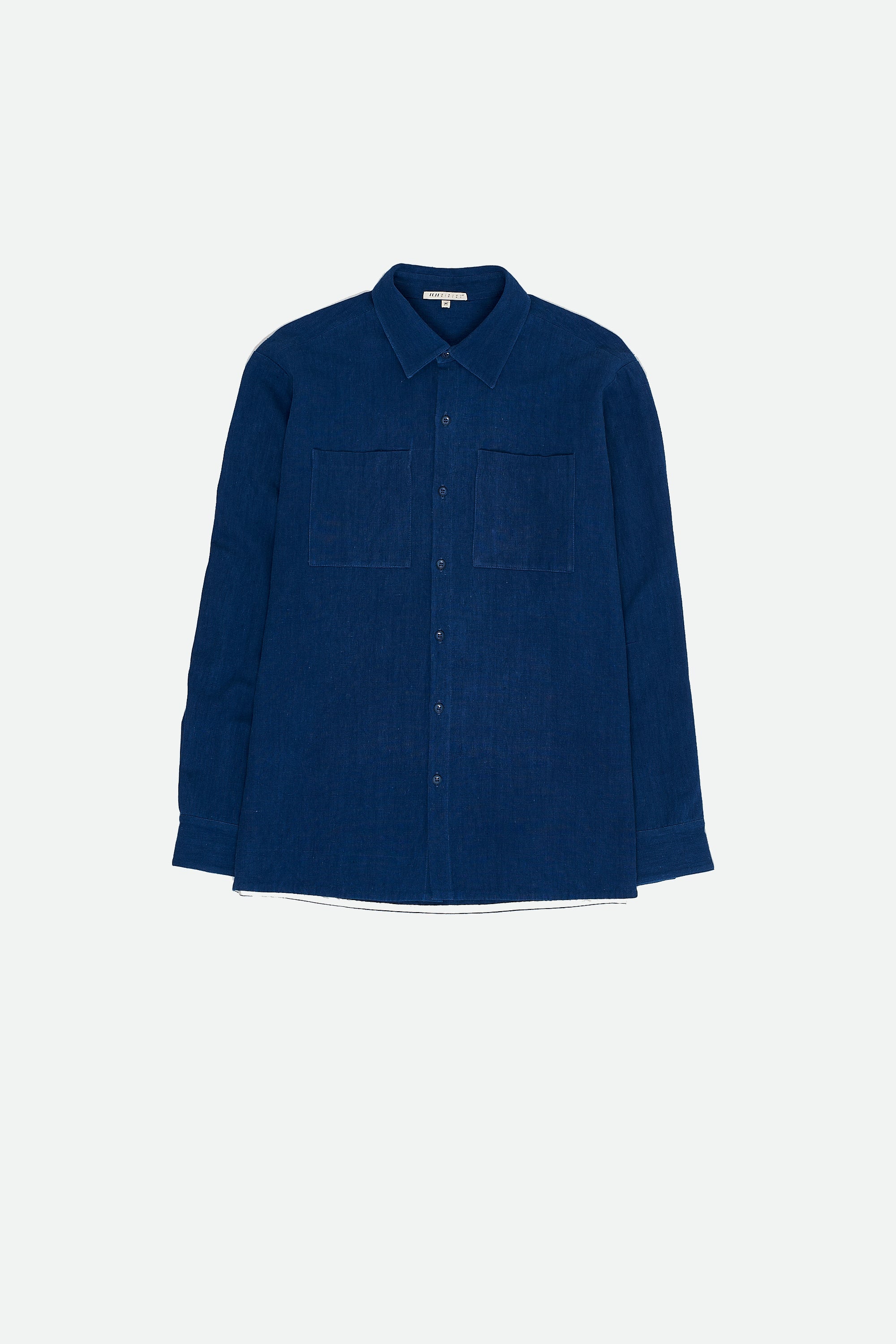 Front image of medium indigo cotton shirt