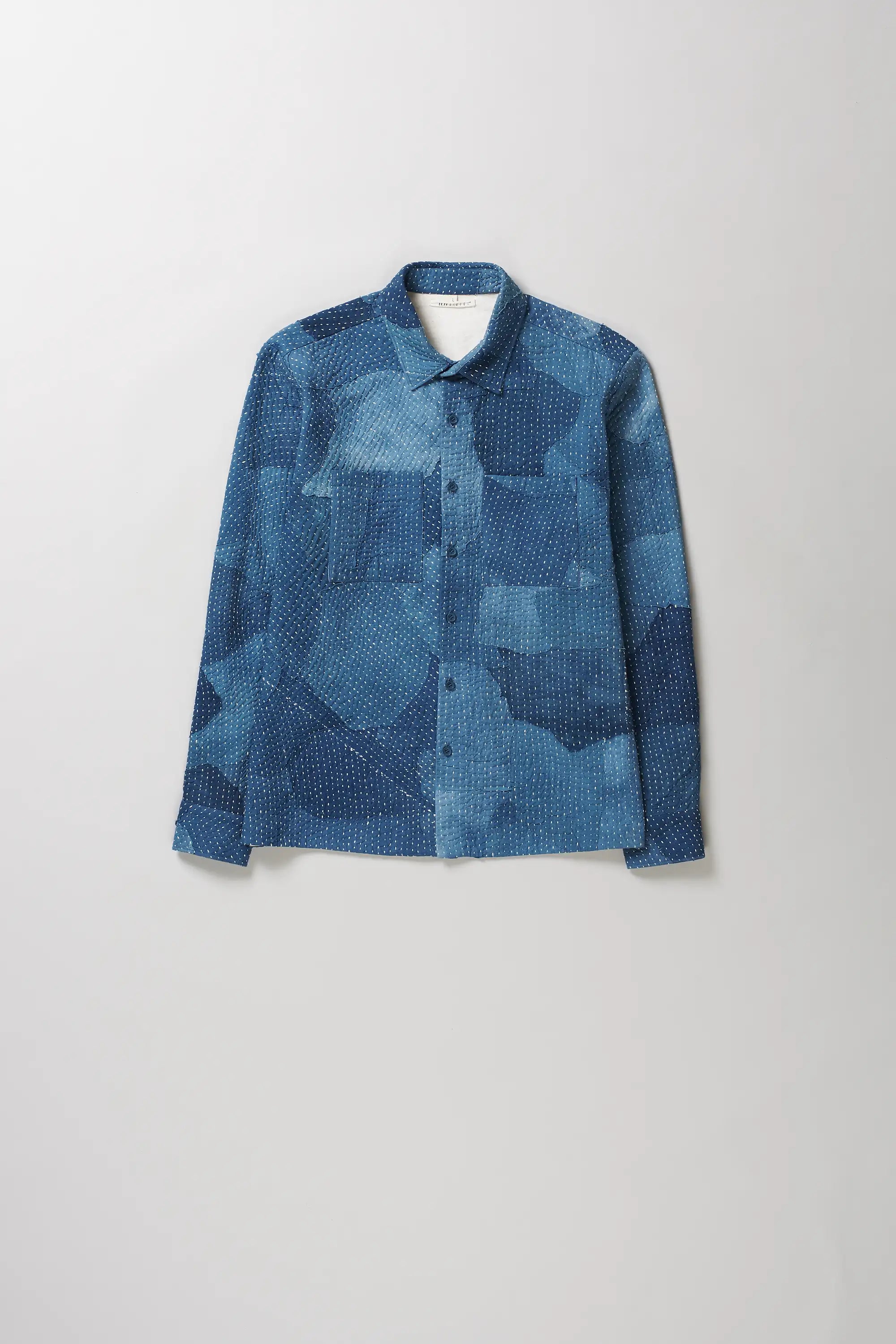 Front image of medium indigo patchwork shirt with kantha