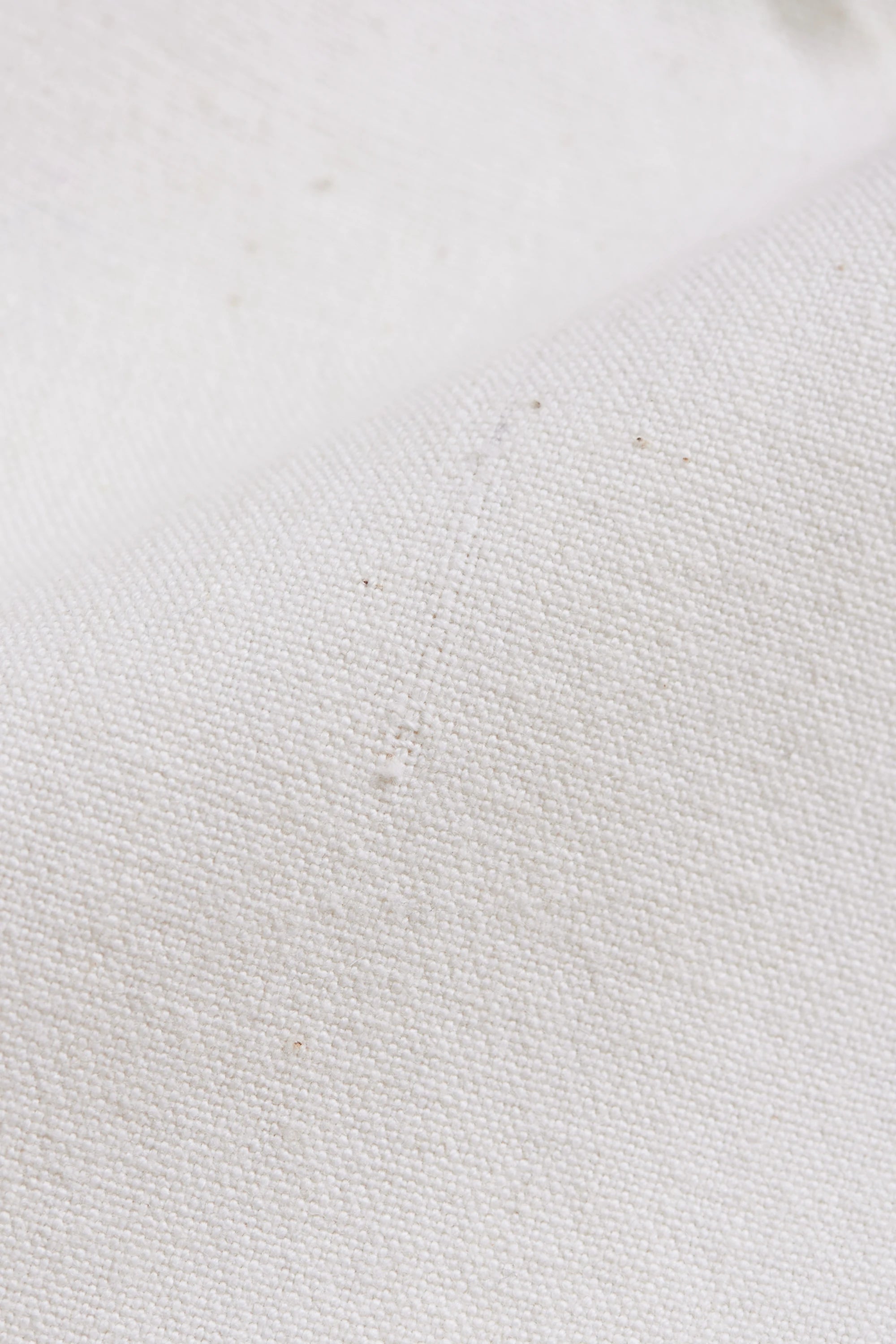 Close-up of ecru fabric
