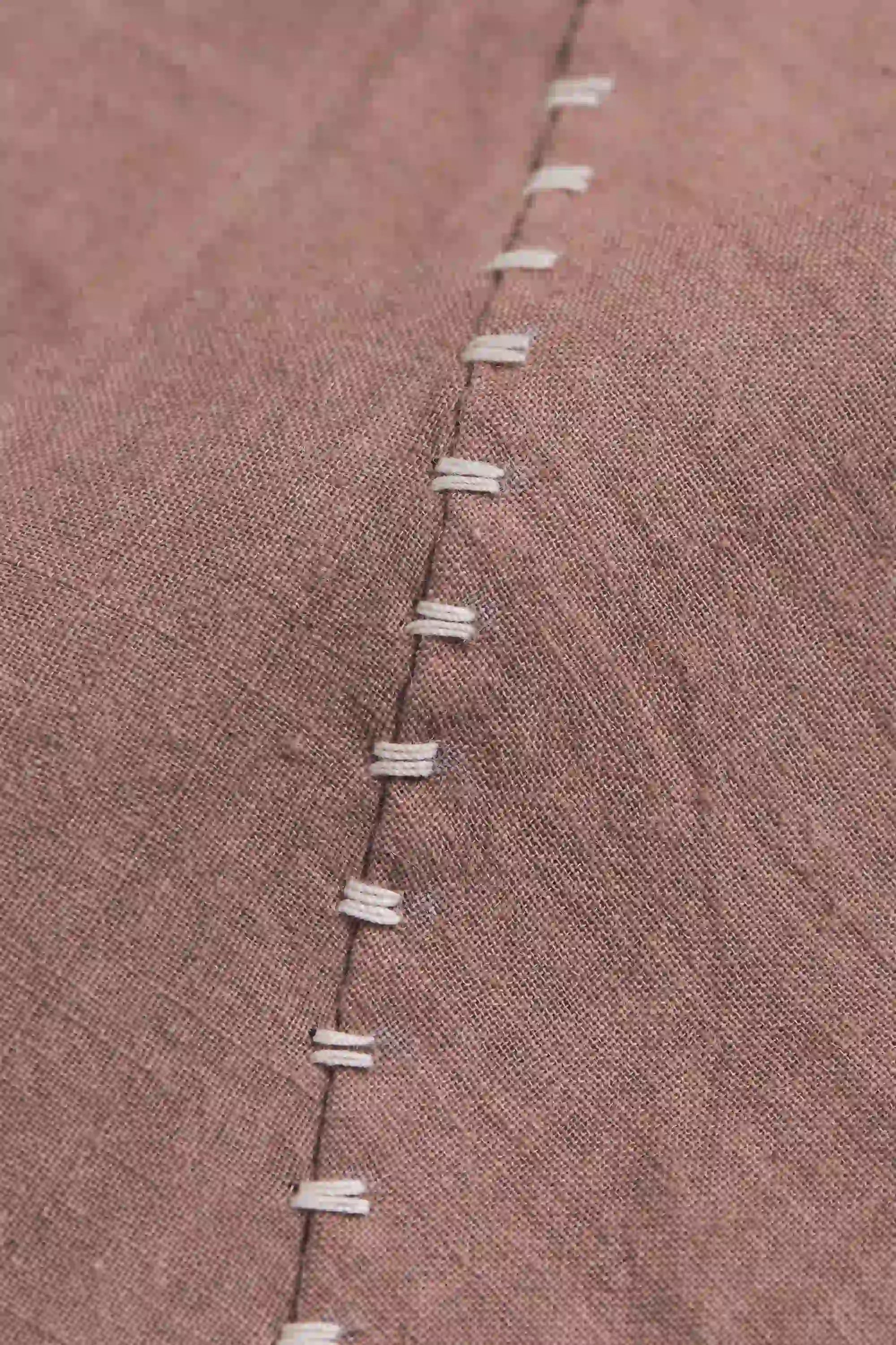 Fabric close-up with hand detailing