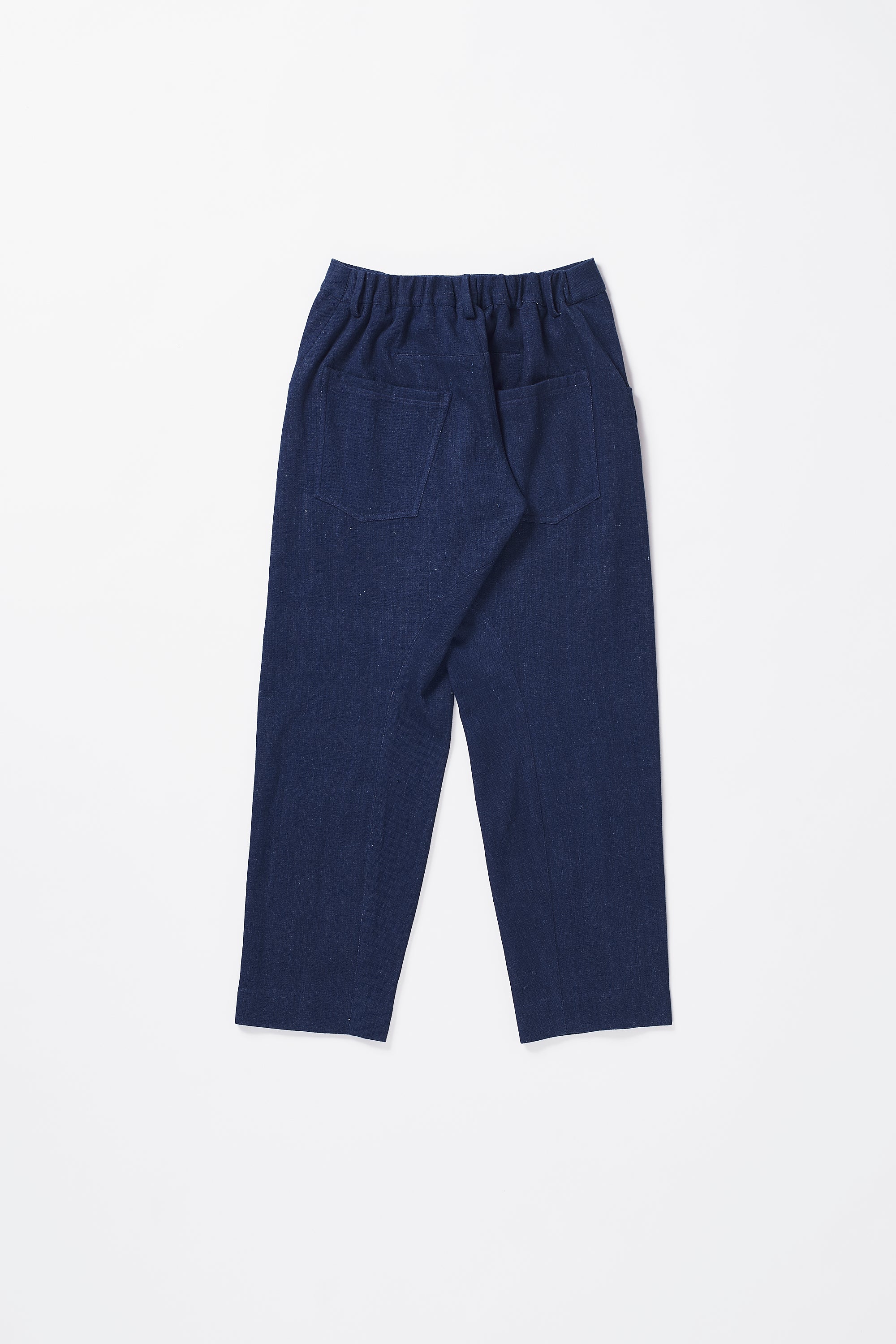 ELASTICATED ENGINEERED HAND-WOVEN INDIGO DENIM TROUSERS