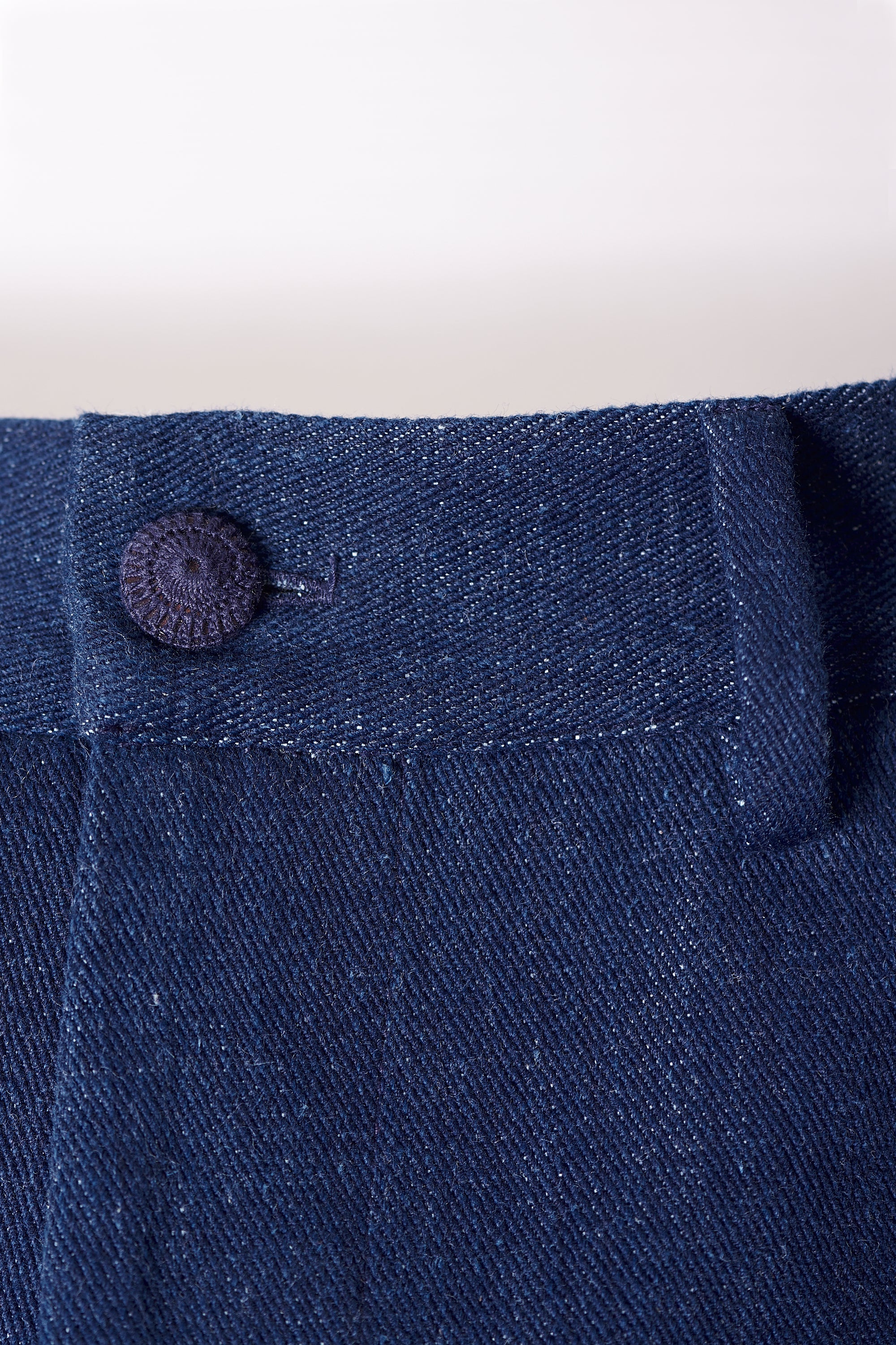 ELASTICATED ENGINEERED HAND-WOVEN INDIGO DENIM TROUSERS