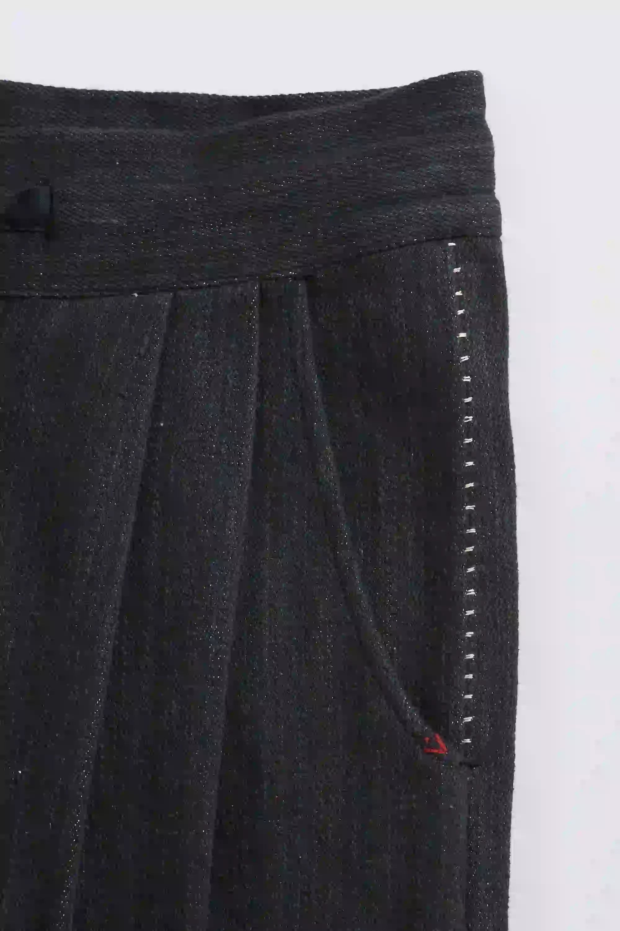 Close-up of pant with hand detailing