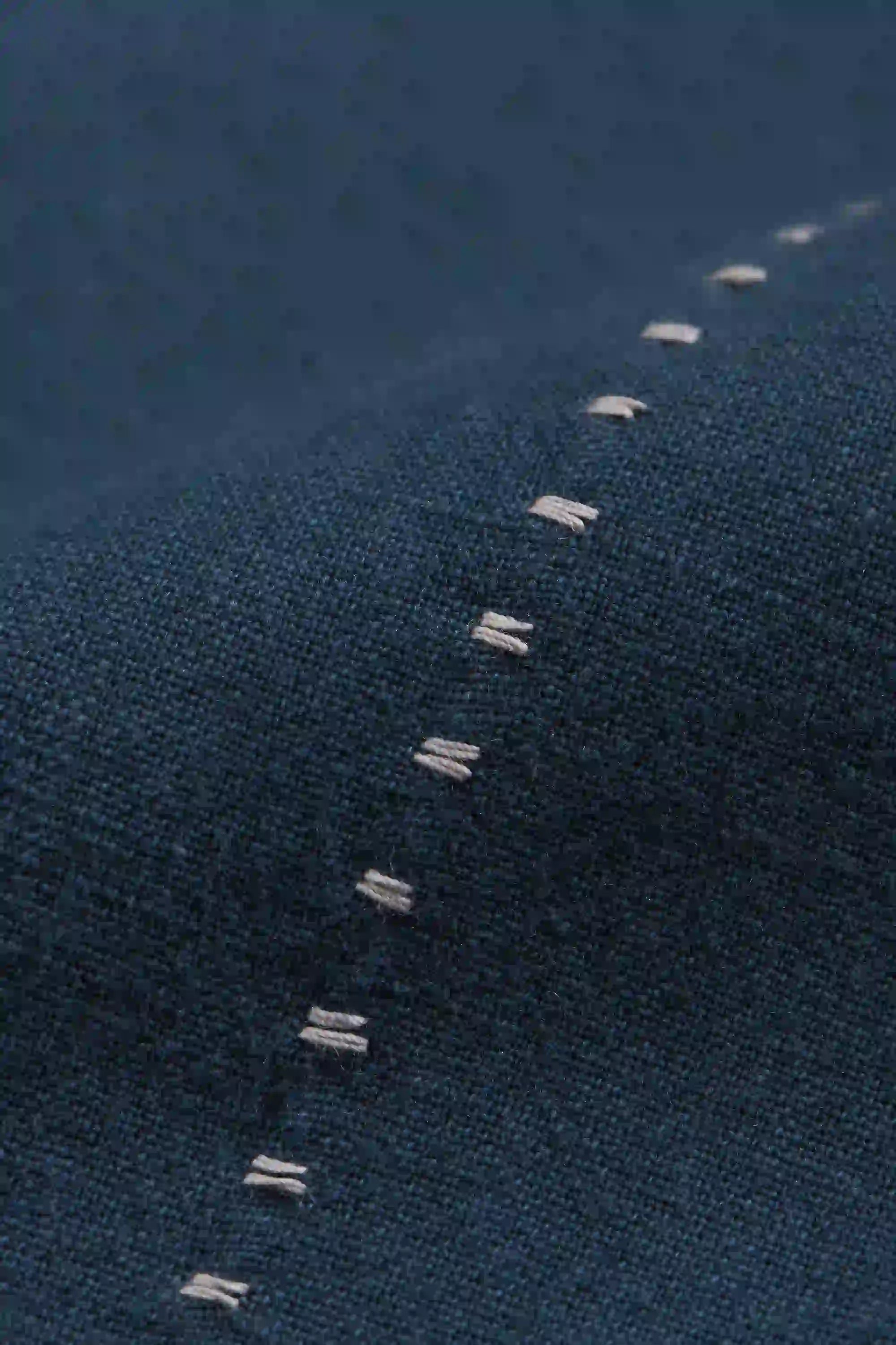 Fabric close-up with hand detailing