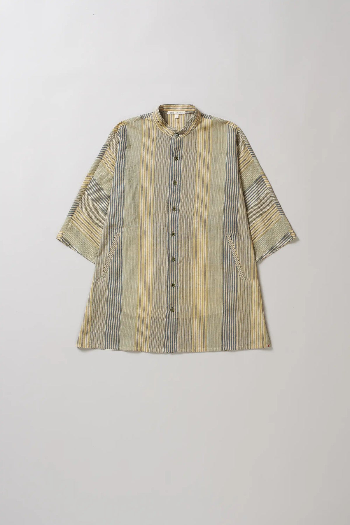 Striped shirt on a light grey background