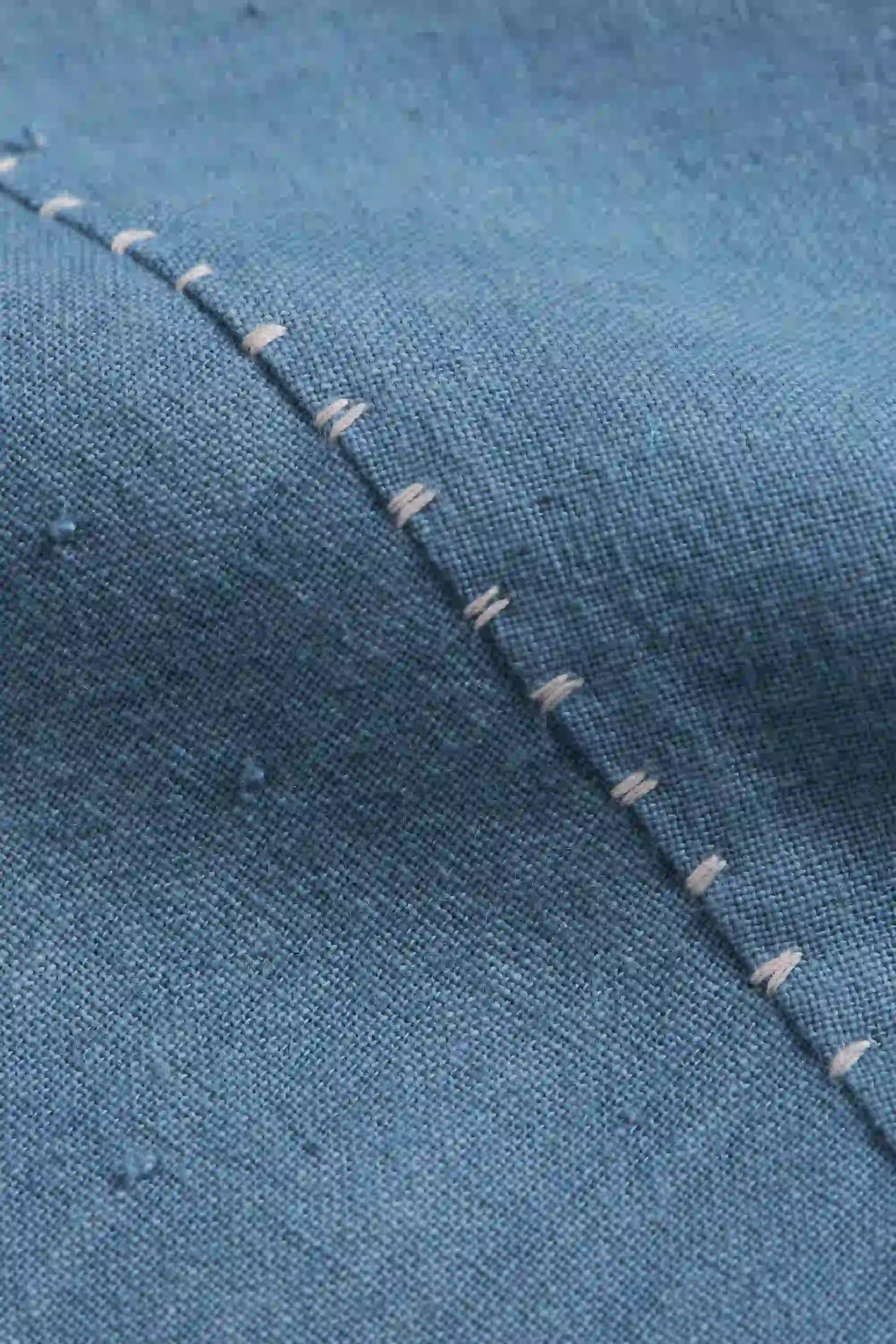 Fabric close-up with hand detailing
