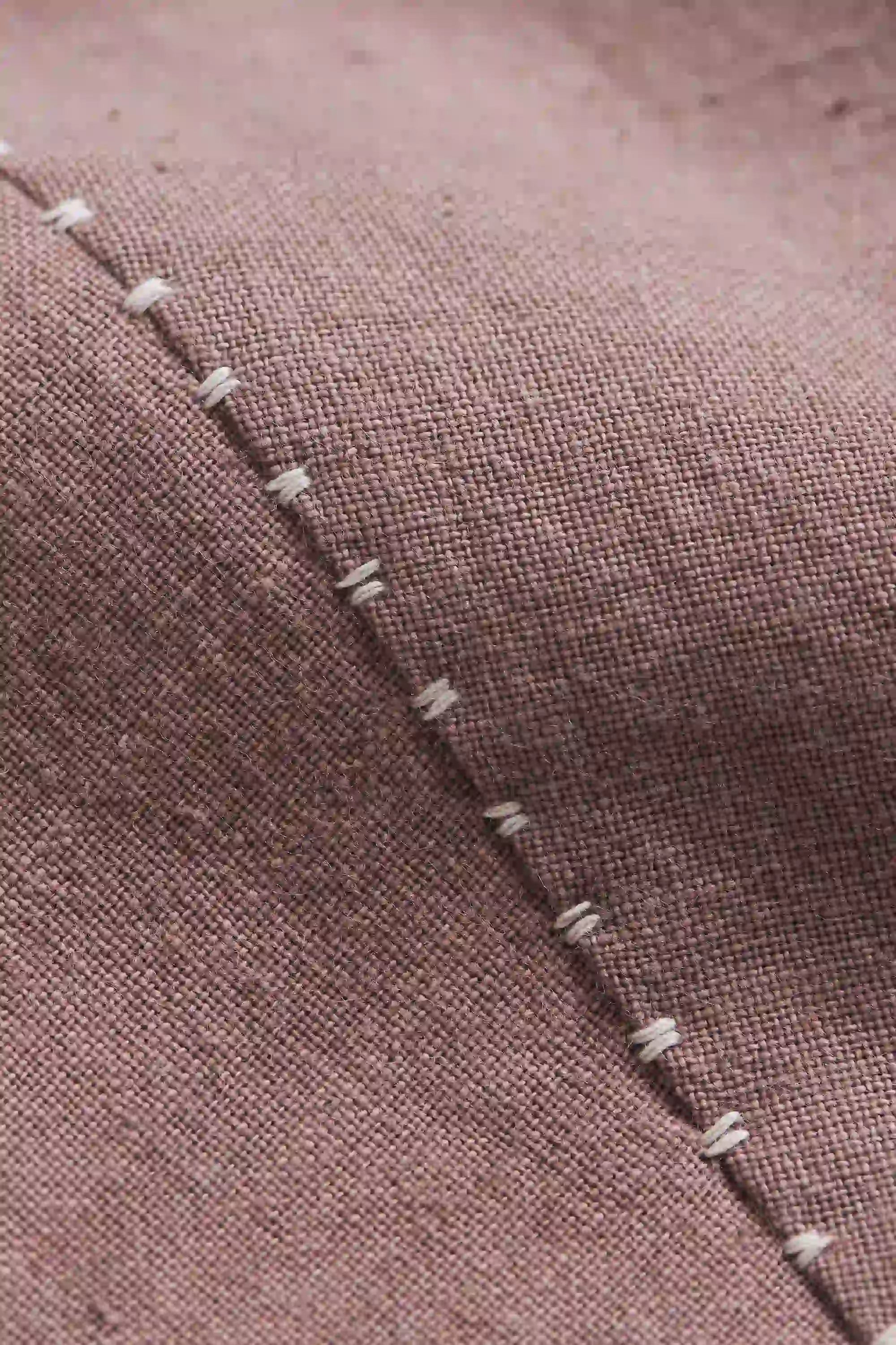 Fabric close-up with hand detailing