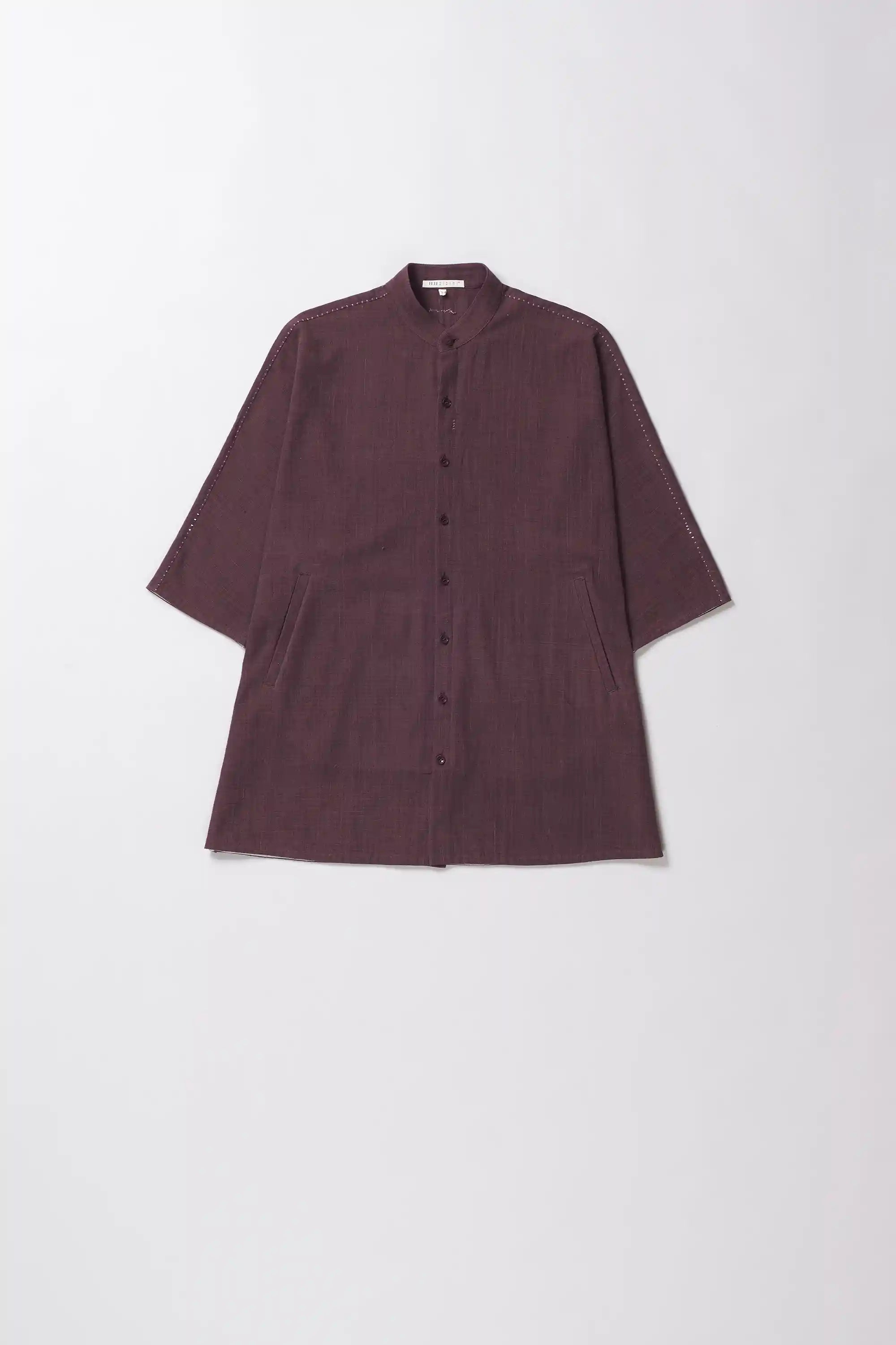 Front image of a purple red shirt