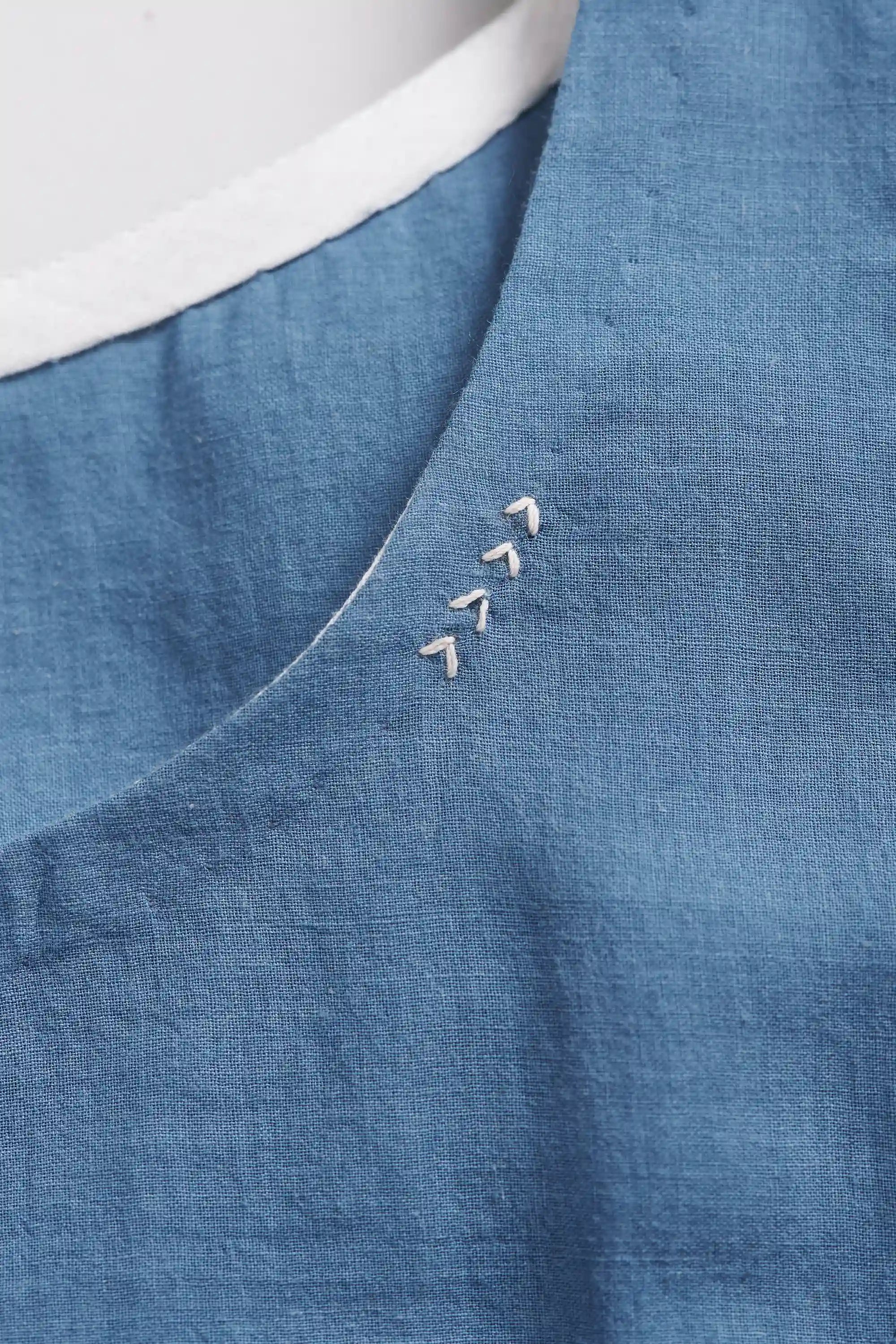 Fabric closeup with hand details
