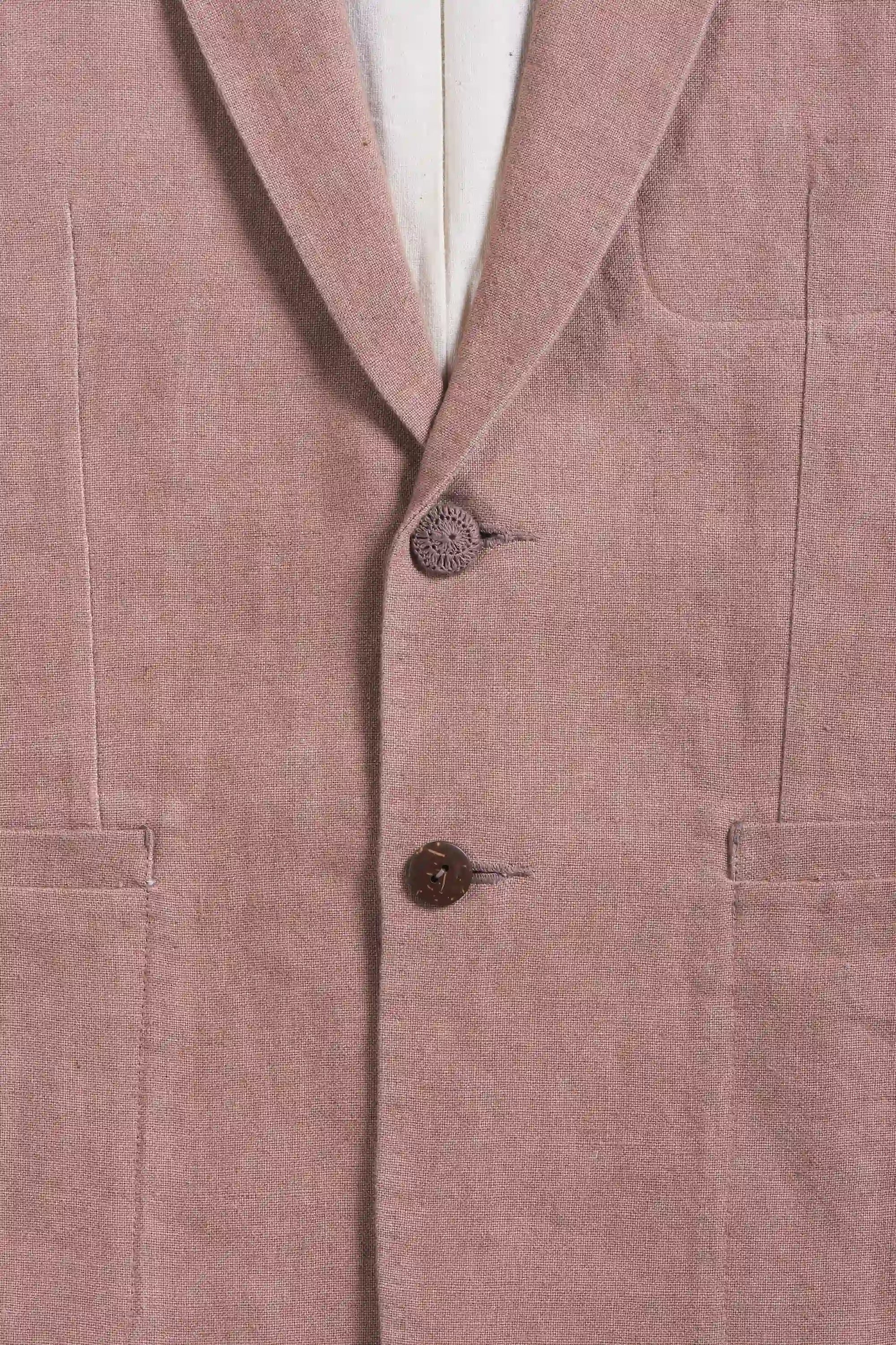 Close-up of a old rose jacket with buttons