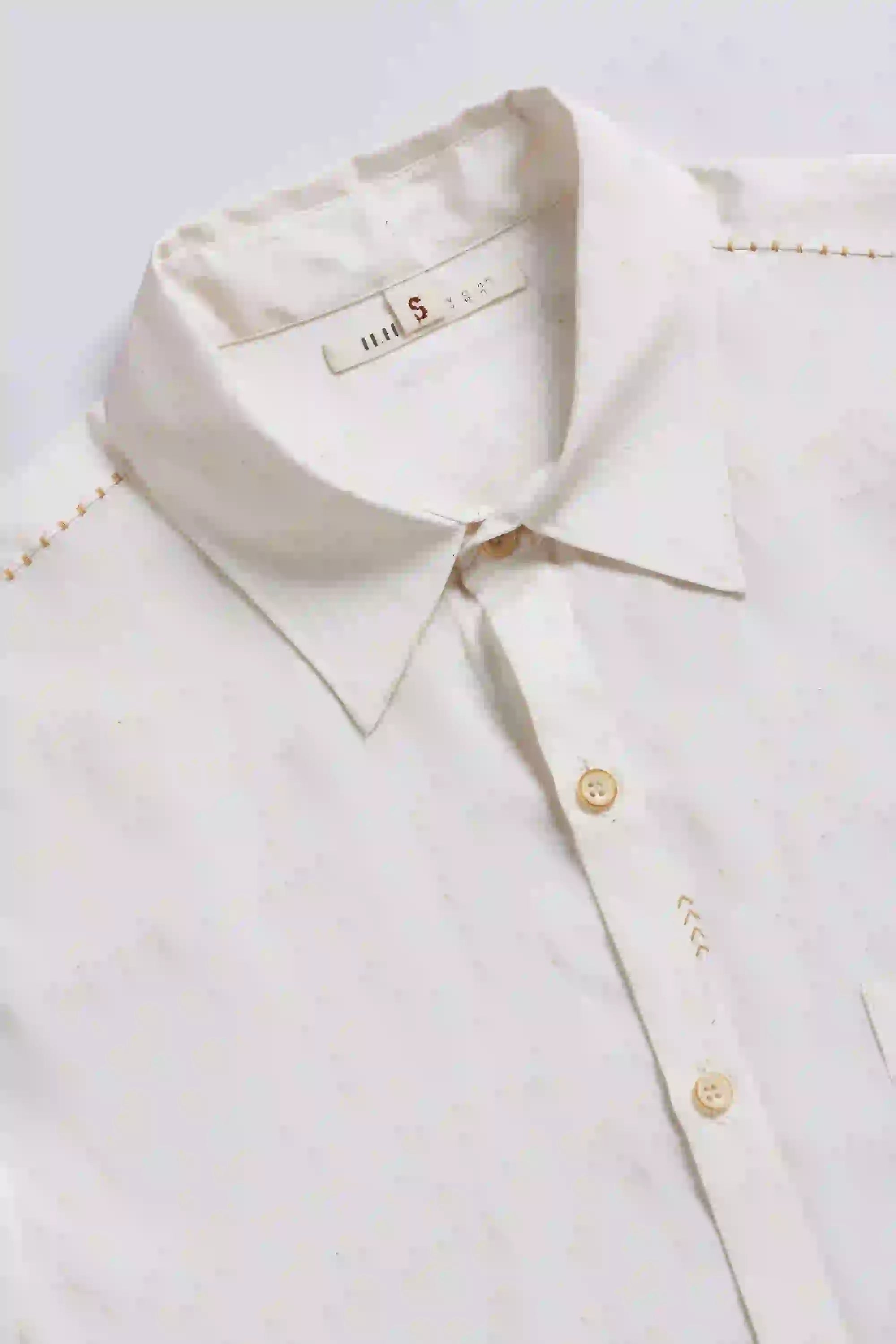 Fabric close-up with collar and buttons