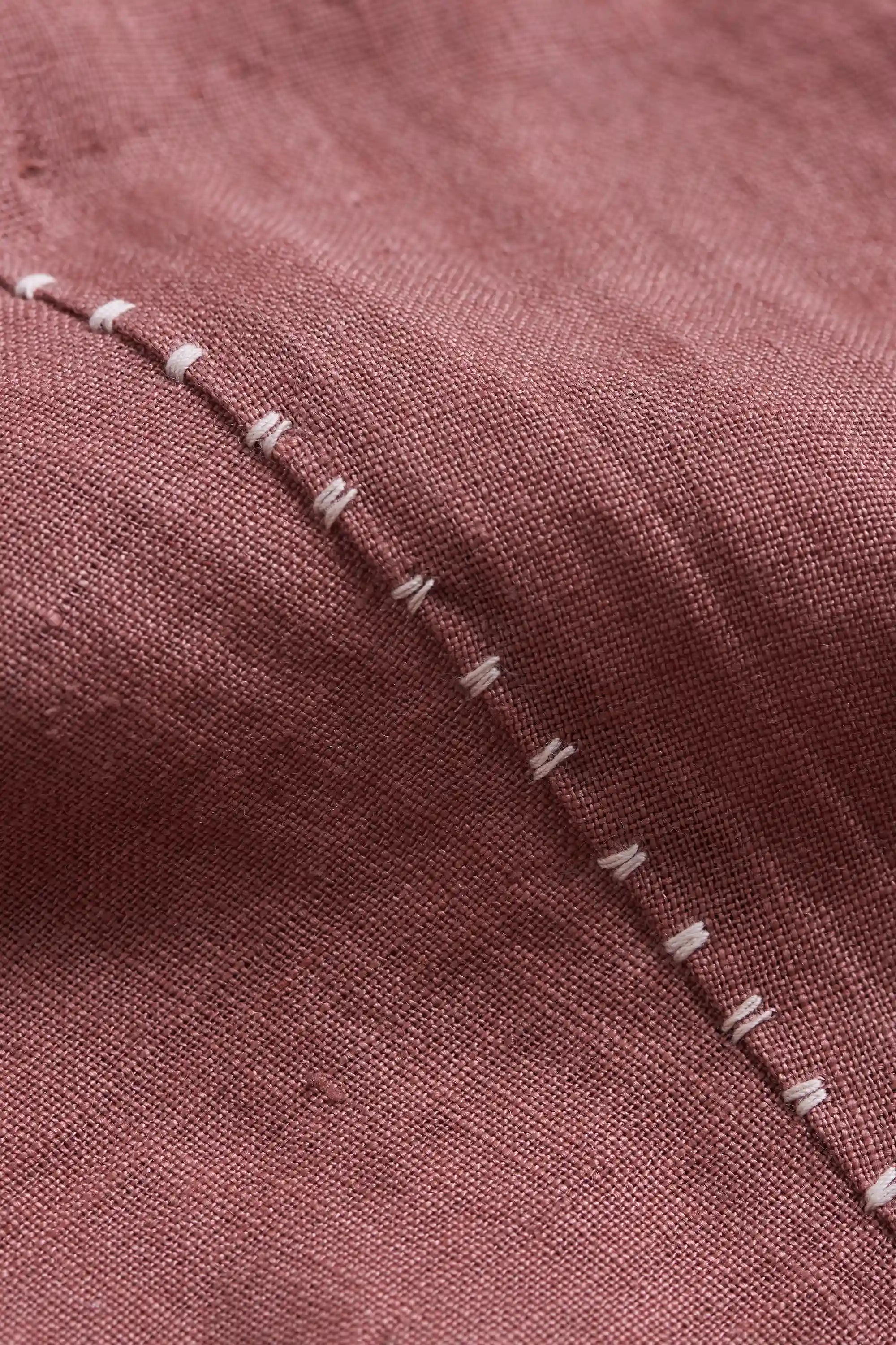 Close-up of fabric with hand detailing