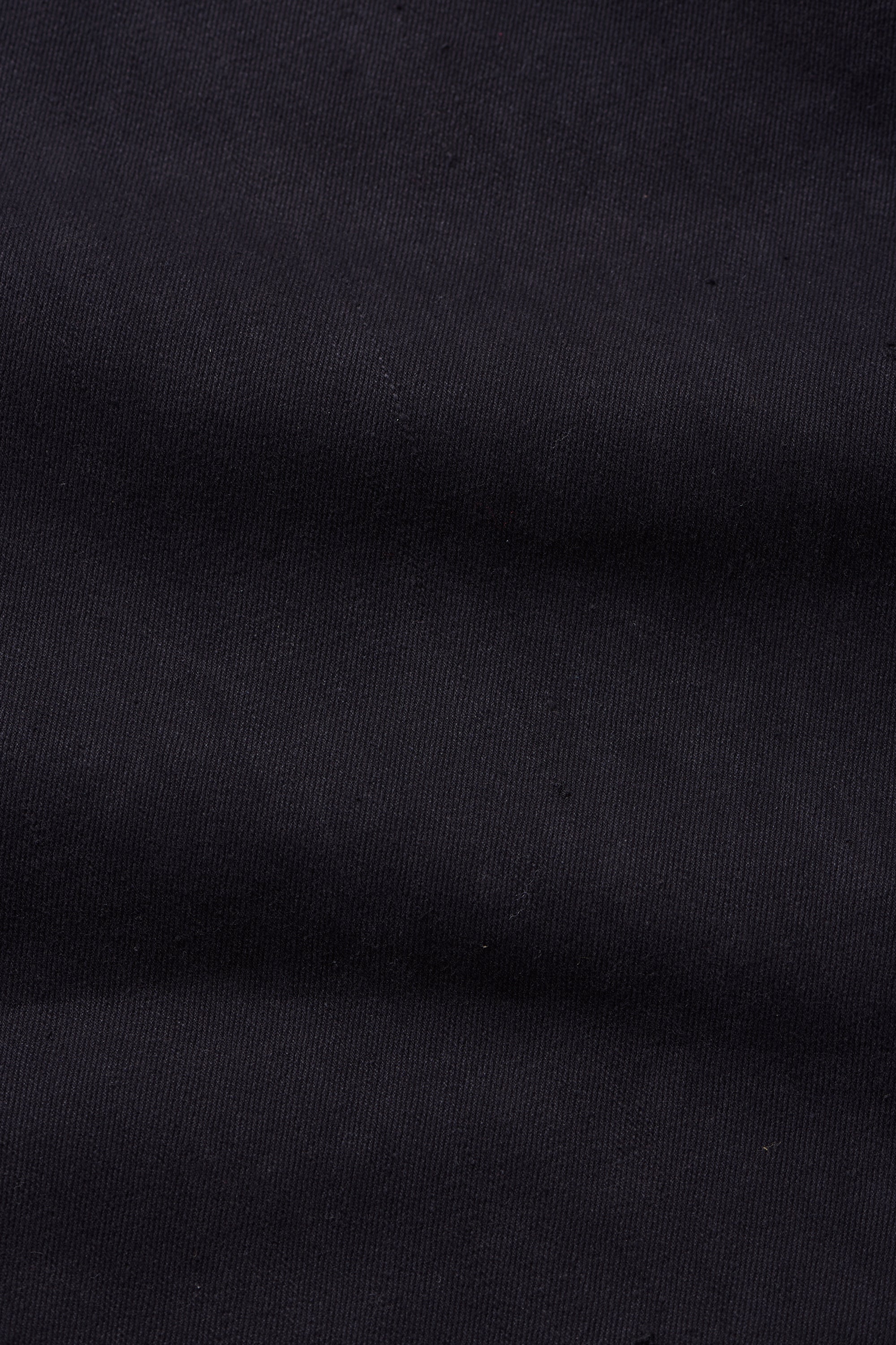 Overlap Pleated Trousers in Black