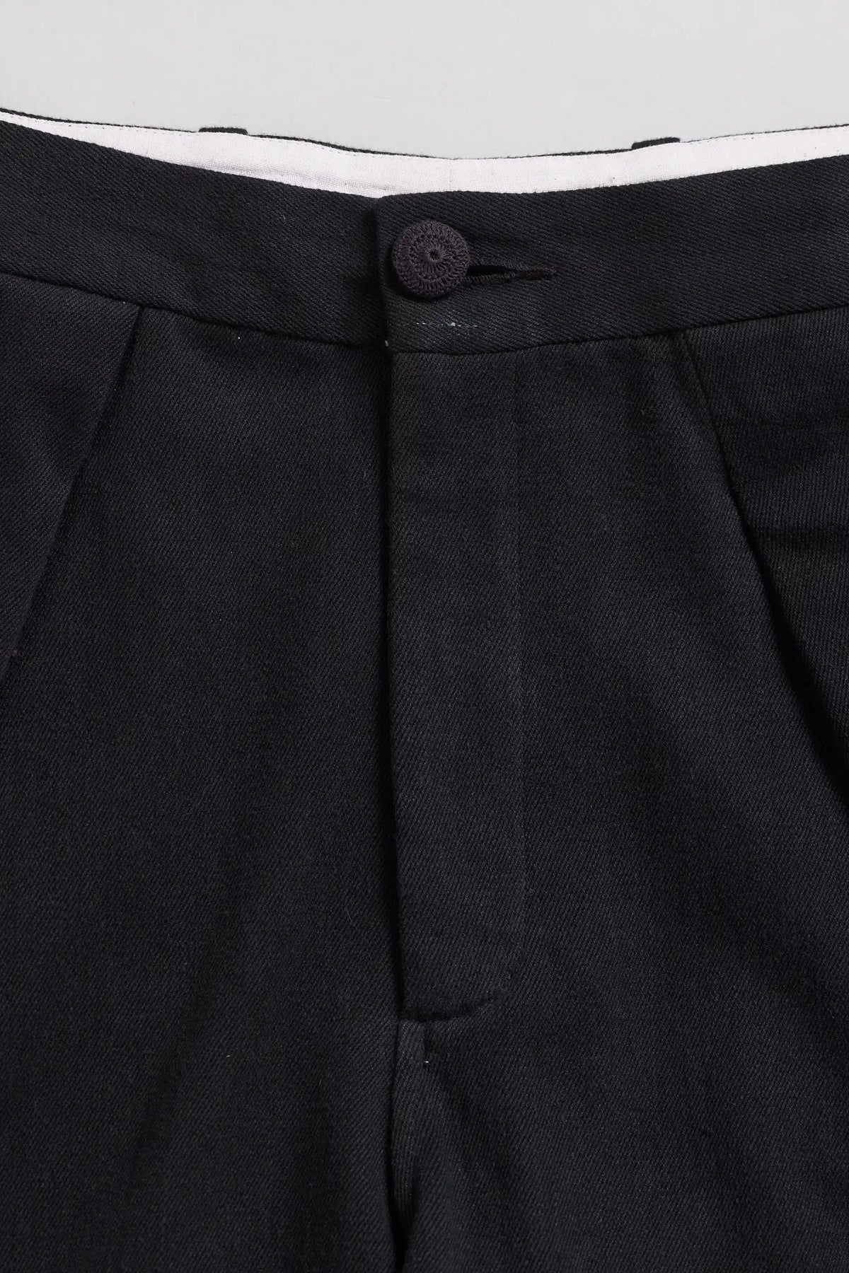 Relaxed Pleated Trousers in Black