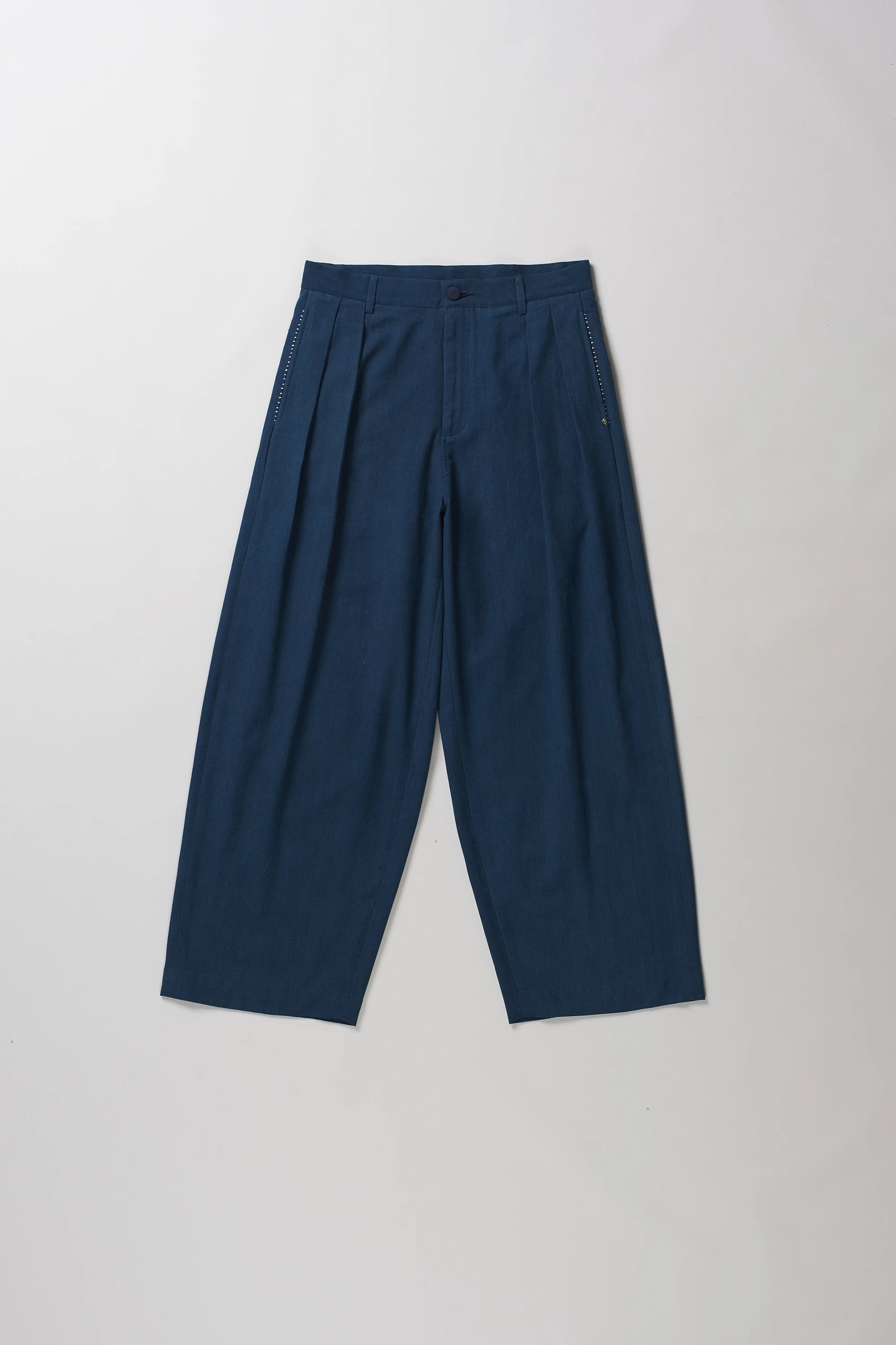 Front image of space blue cotton pant with hand details