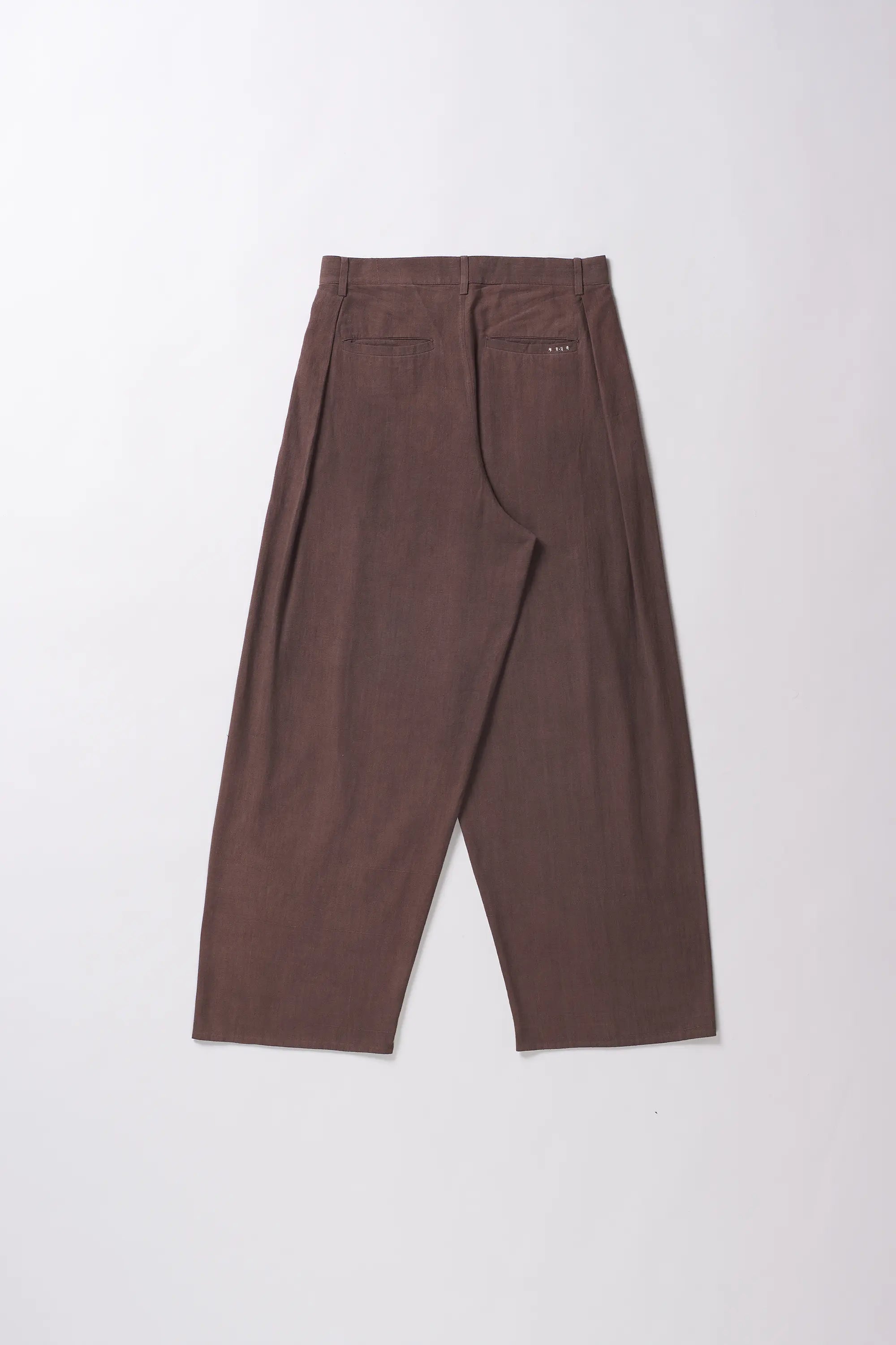 Back shot of a burnt umber wide trousers