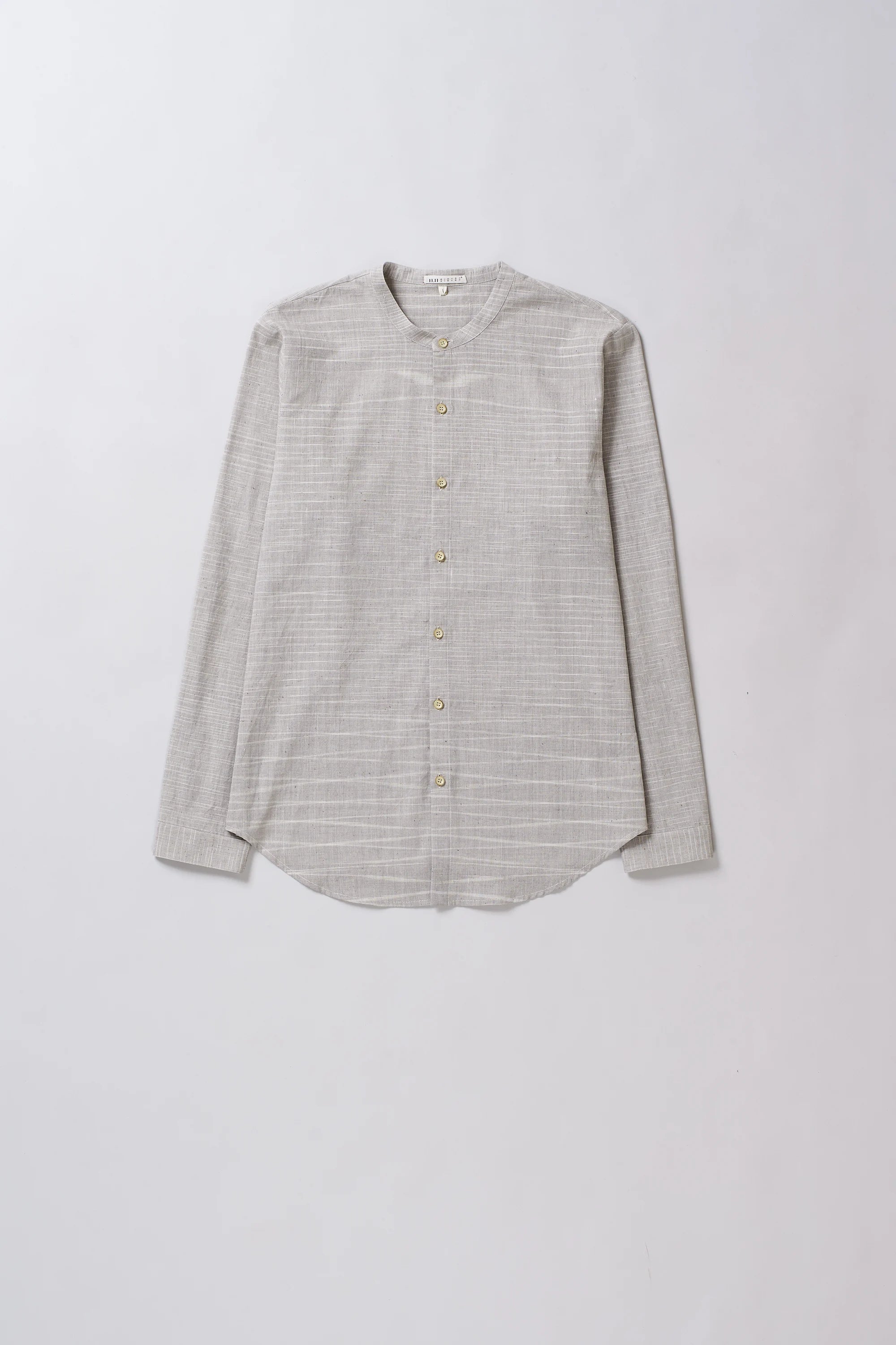 Light gray striped shirt on a white background