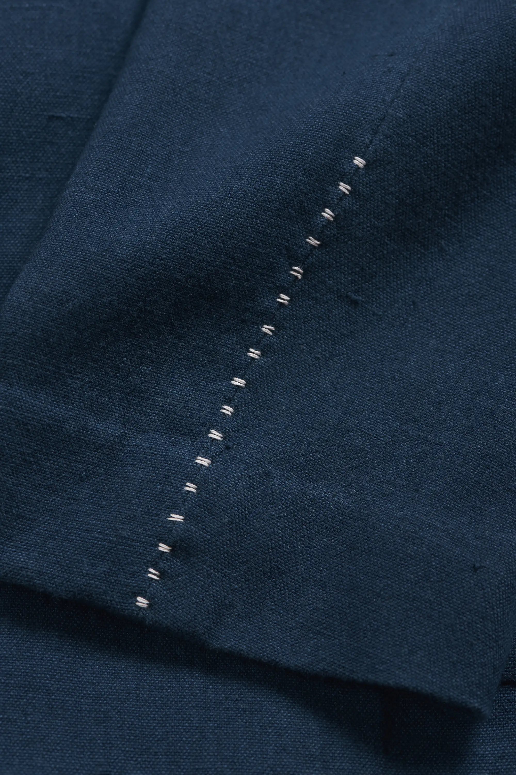 Cotton fabric close-up with hand details