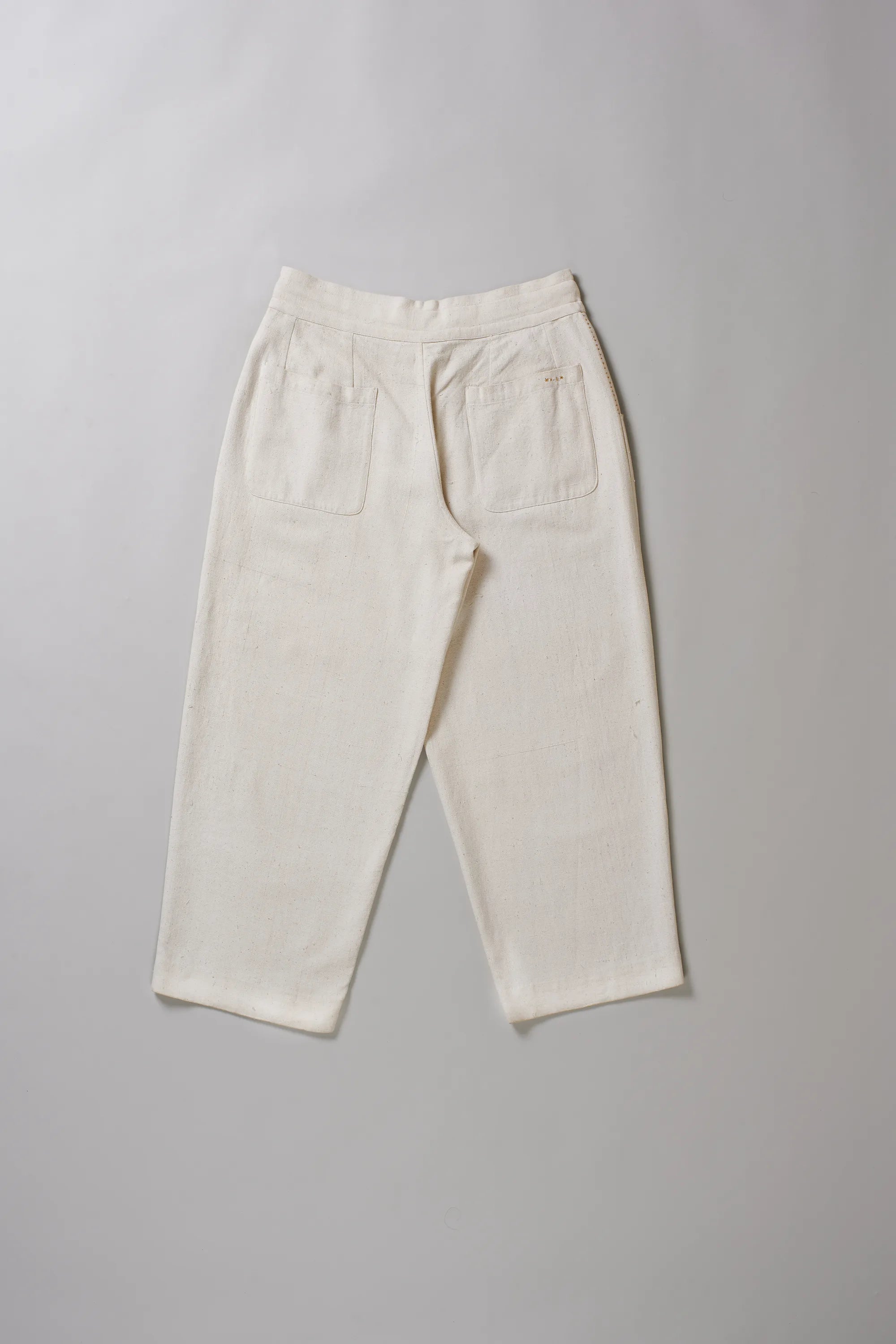 Back image of ecru cotton pant