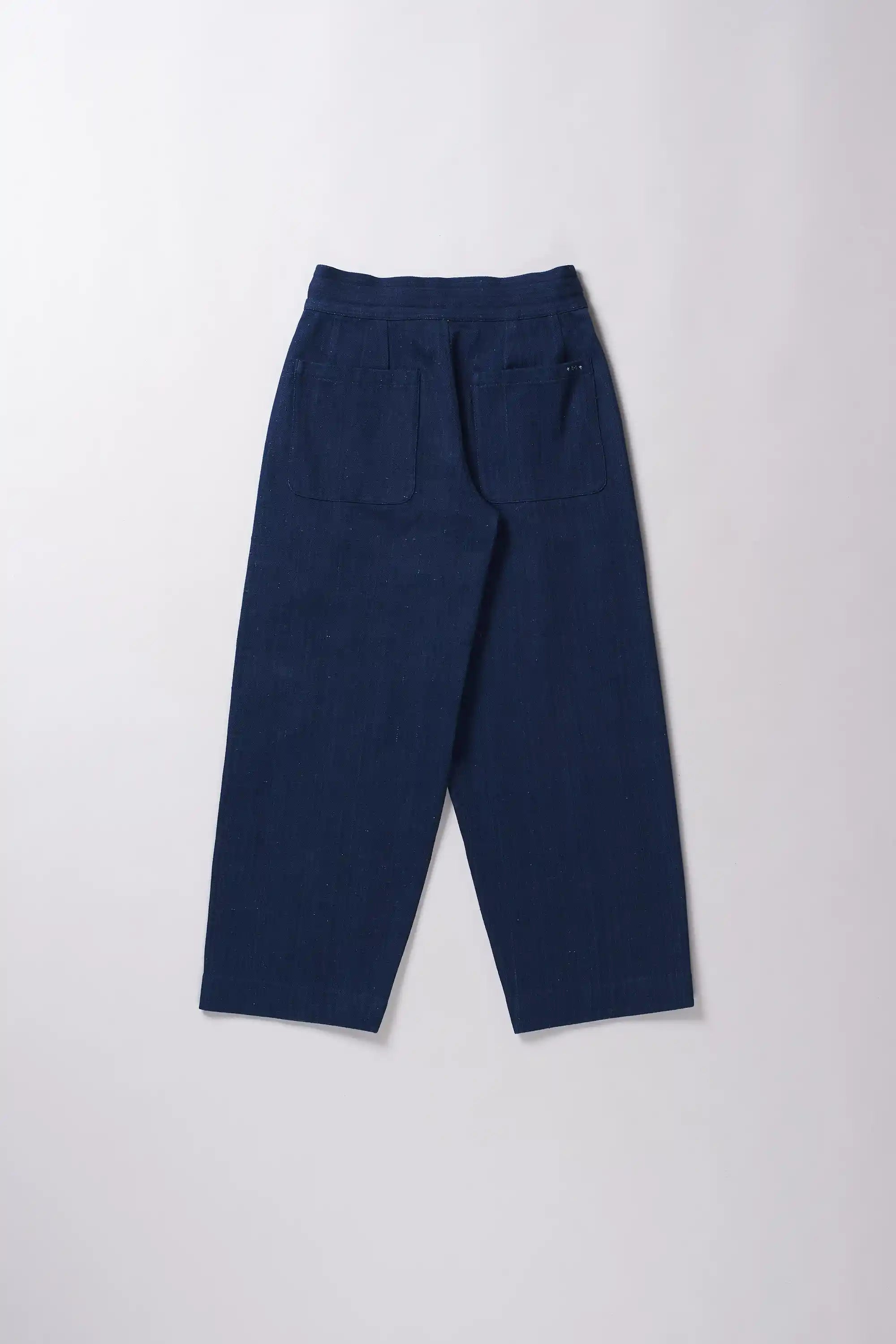 Back image of a indigo pants on a white background
