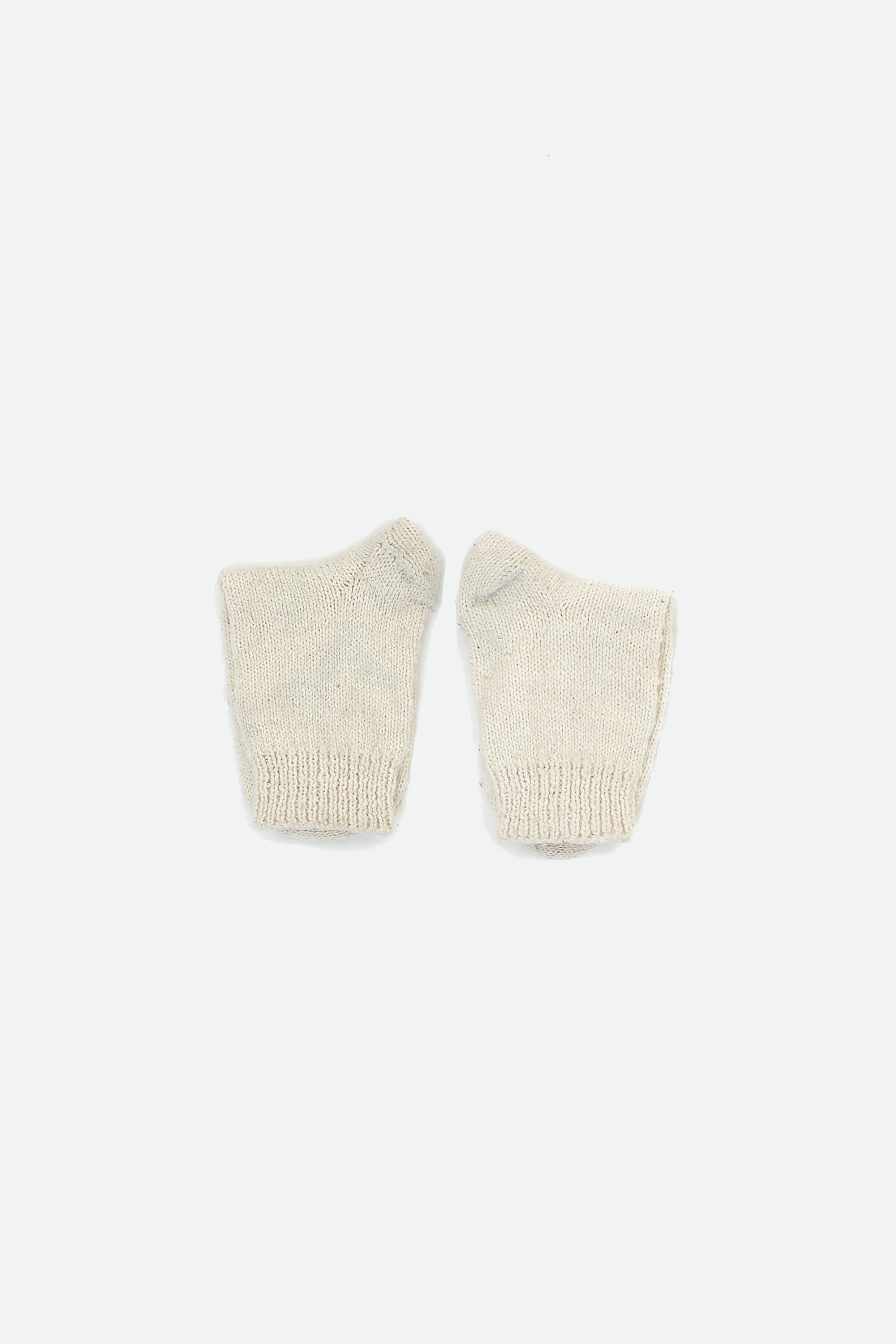 HAND-KNITTED PAIR OF SOCKS IN ECRU