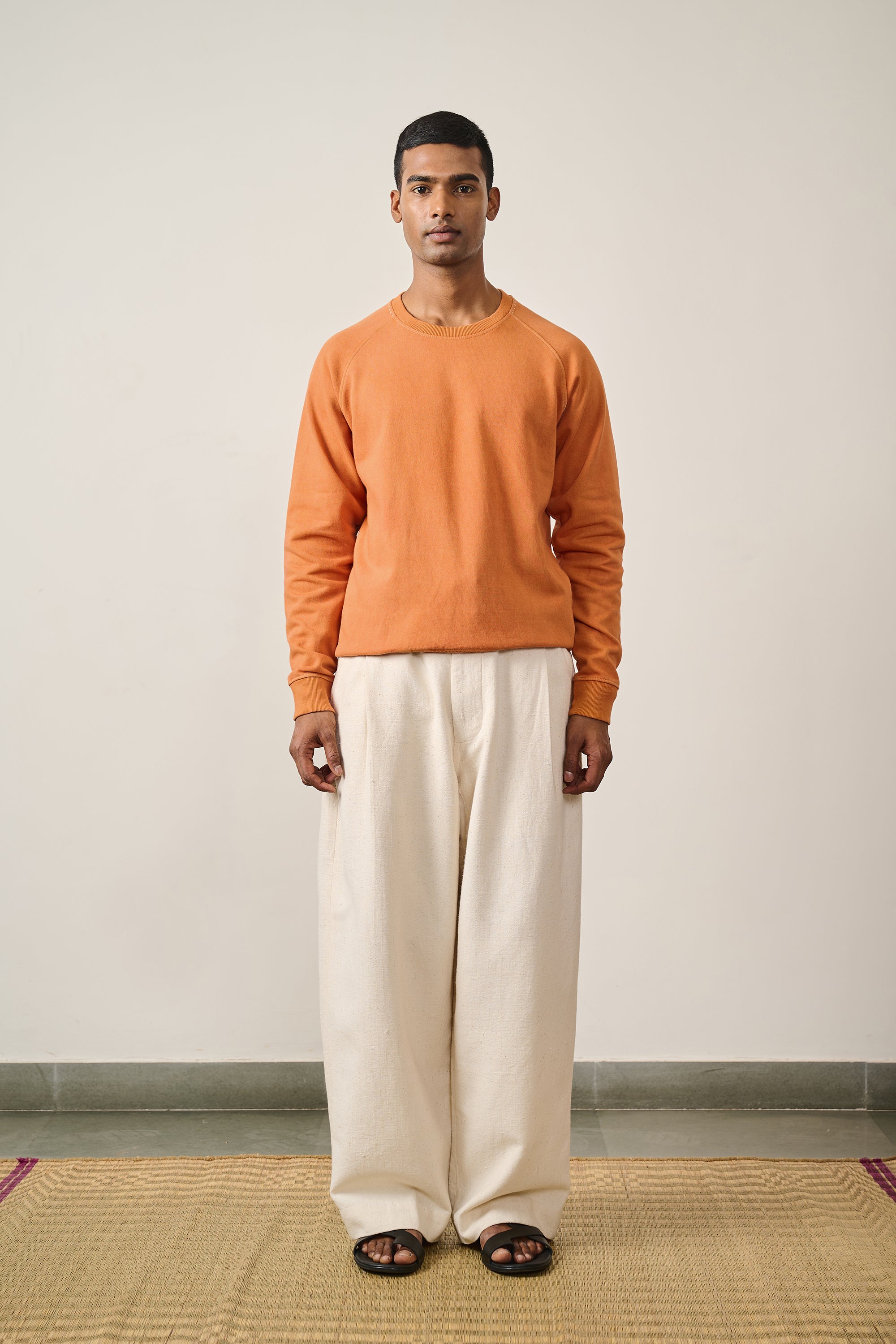 UNISEX SWEATSHIRT IN SUNSET ORANGE