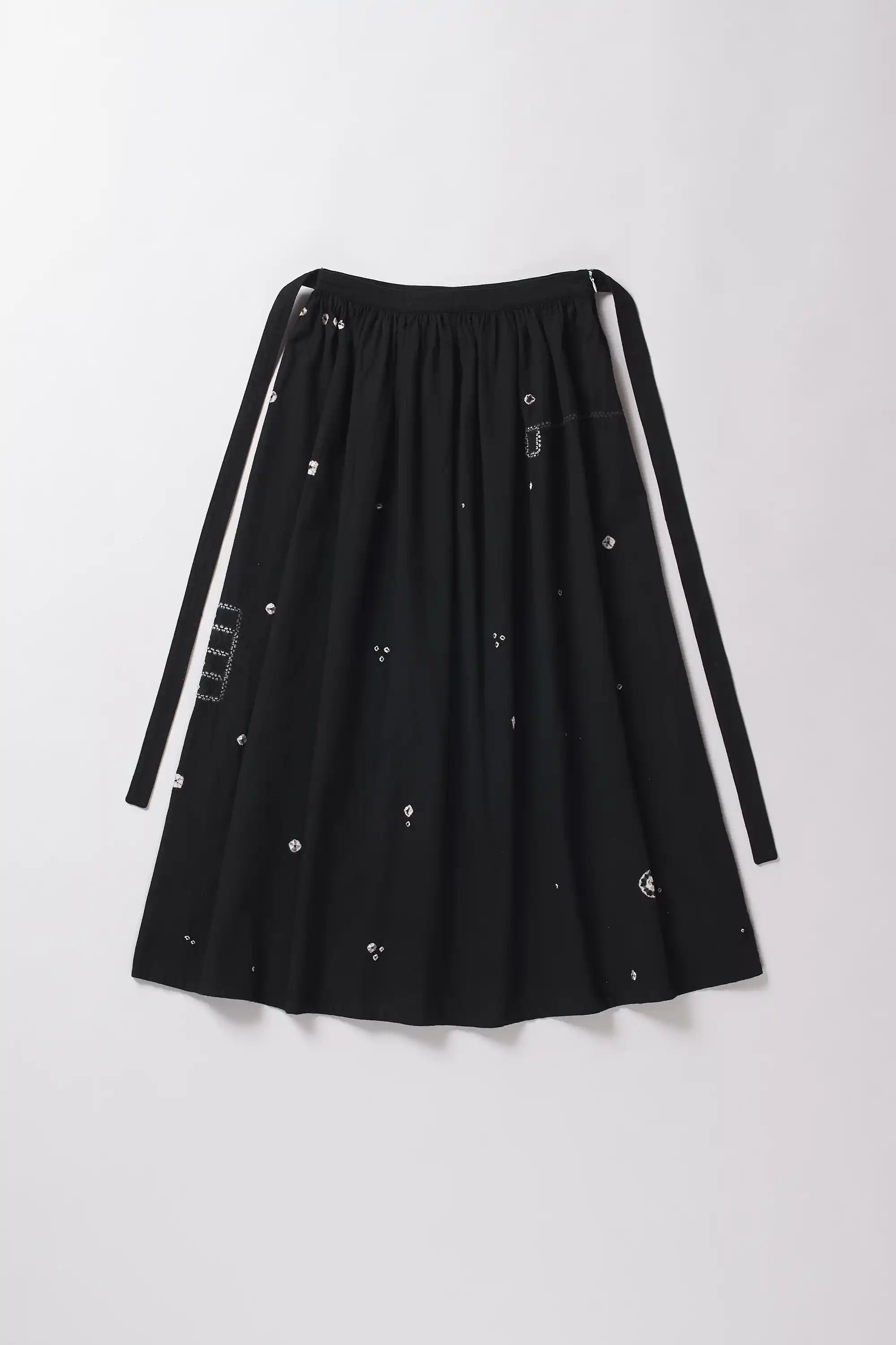 Black skirt with white accents on a white background