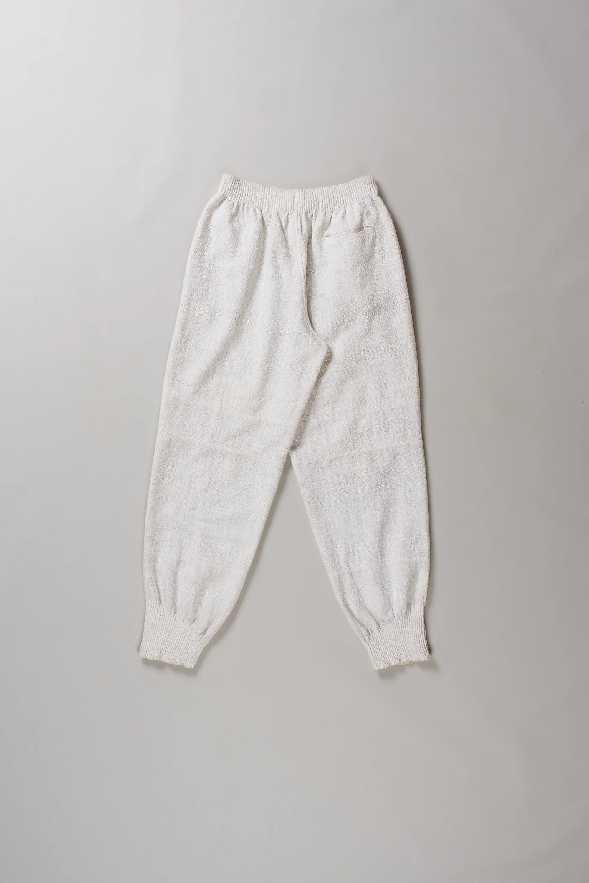 Back image of ecru cotton pant with pocket